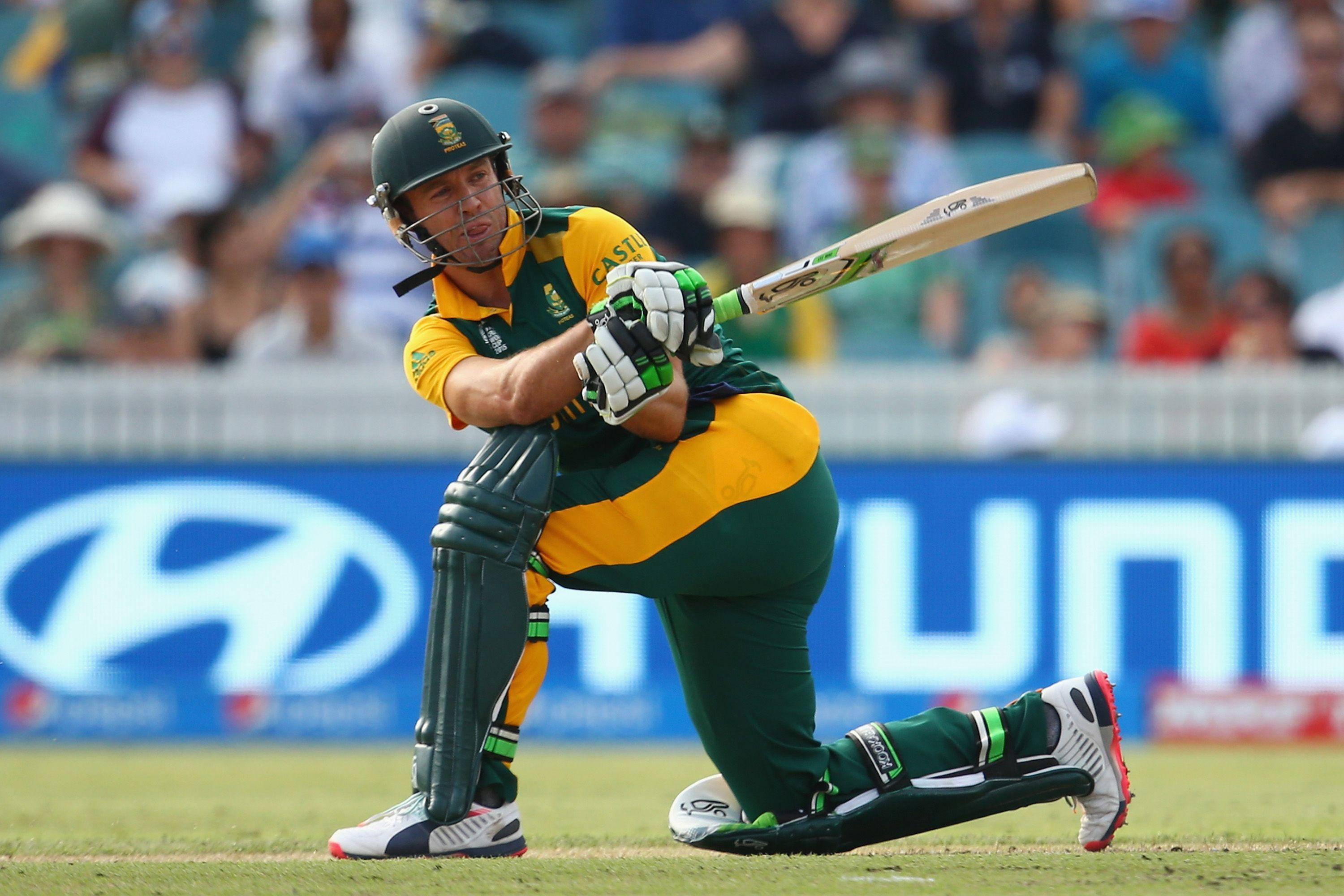 Ab De Villiers, green and yellow uniform, sunlit field, 2K Desktop Wallpaper