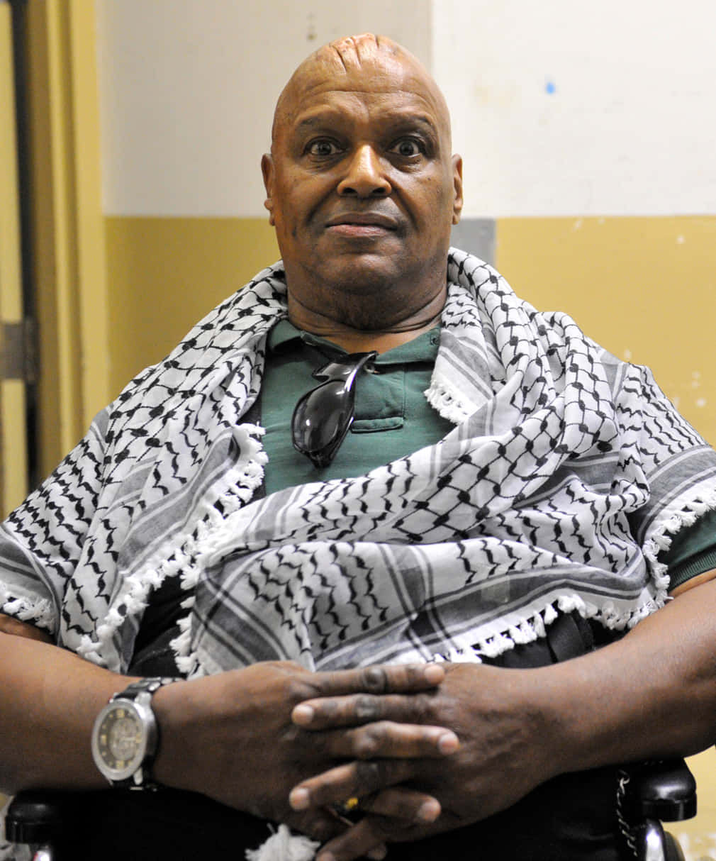 Abdullah The Butcher, wheelchair, black and white checkered keffiyeh scarf, SD Phone Wallpaper