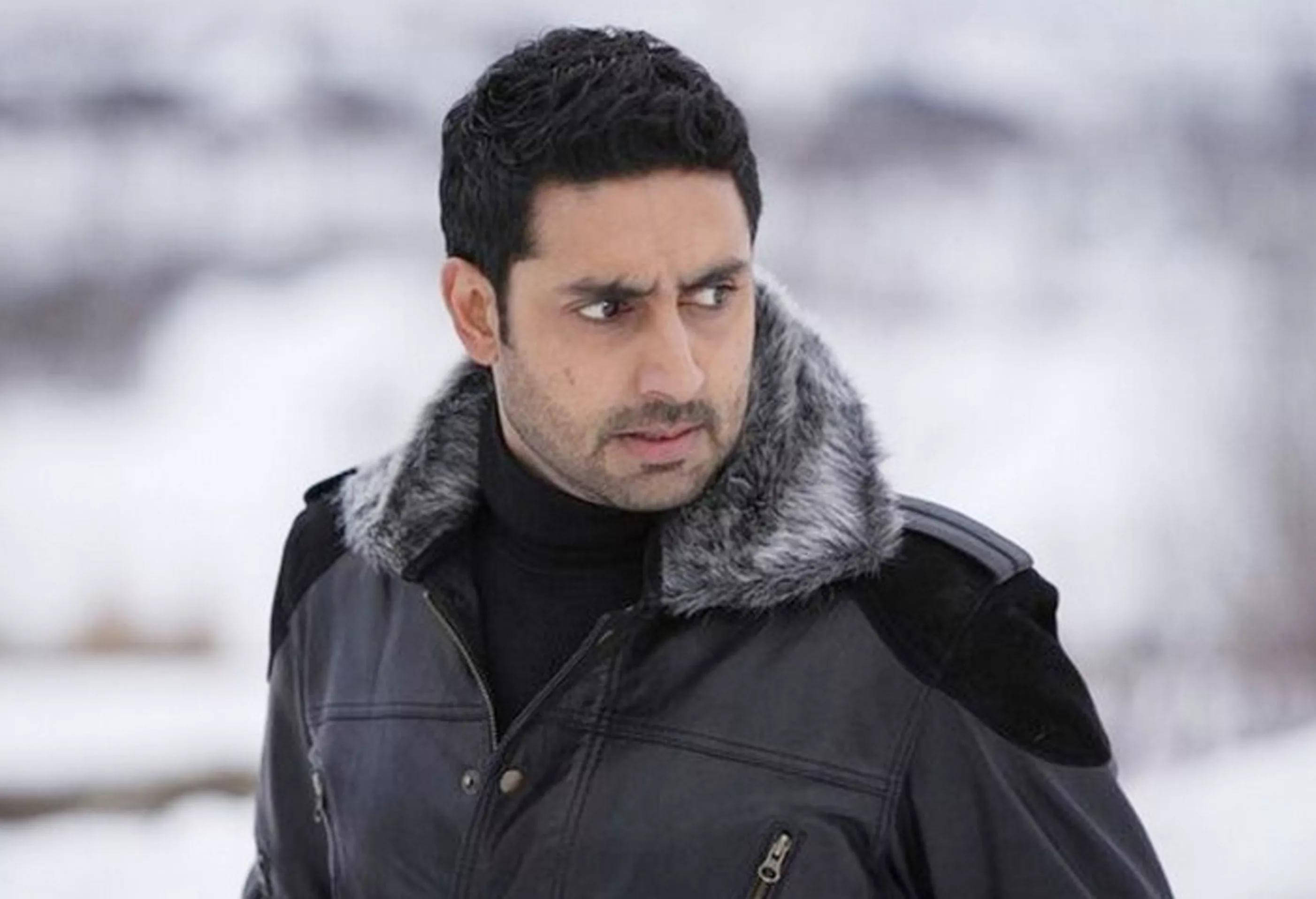 Abhishek Bachchan, black winter coat, fur-lined hood, 2K Desktop Wallpaper