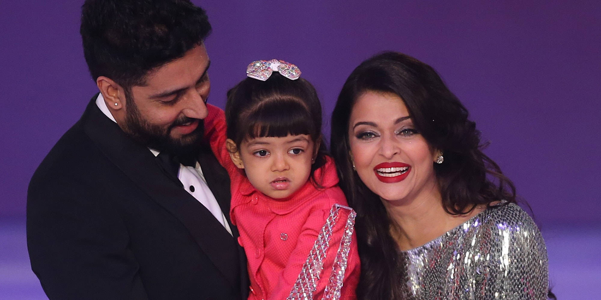 Abhishek Bachchan, daughter, purple backdrop, Full HD Desktop Wallpaper