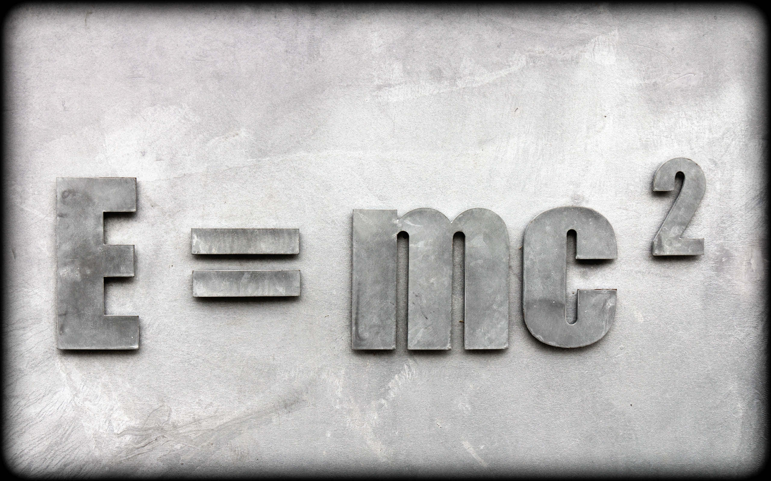 E equals mc squared, metallic, weathered gray concrete wall, 2K Desktop Wallpaper