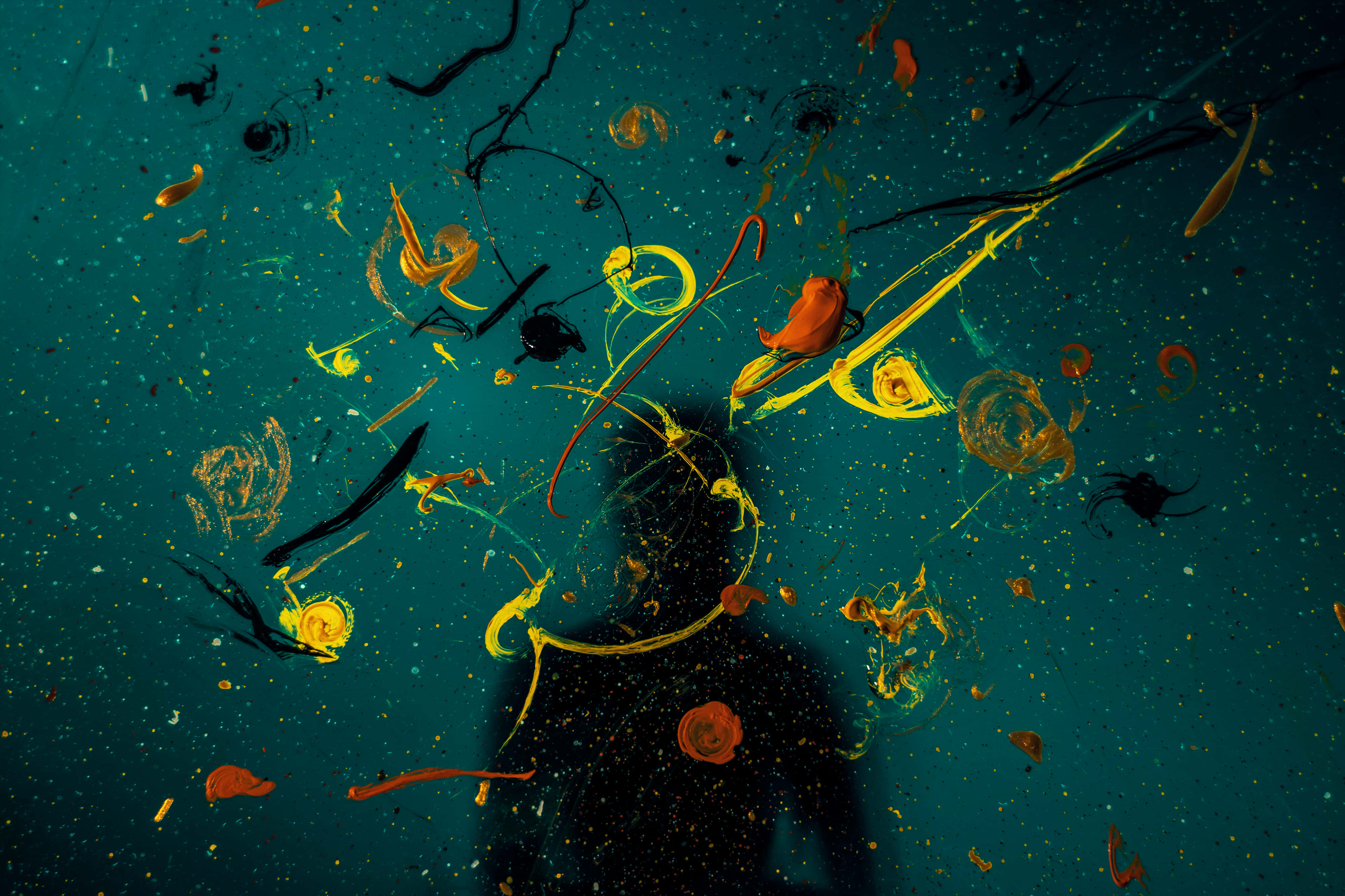 vibrant yellow orange, black paint splatters, deep teal background, 4K Desktop Wallpaper