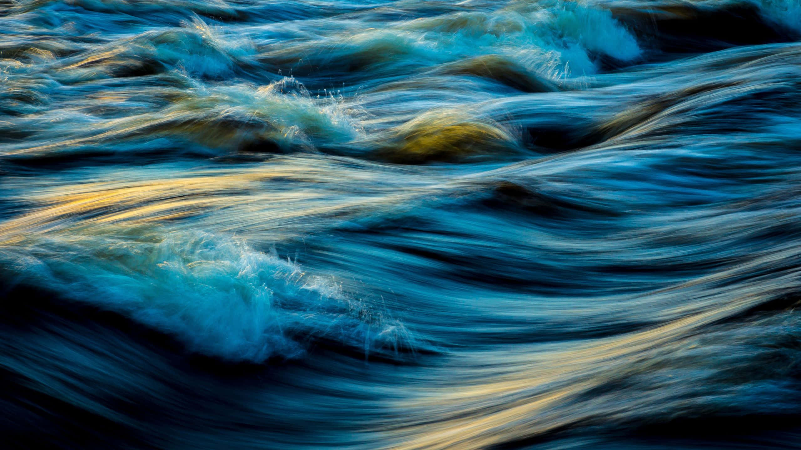 Abstract River Currents, deep blue water, golden streaks, 2K Desktop Wallpaper