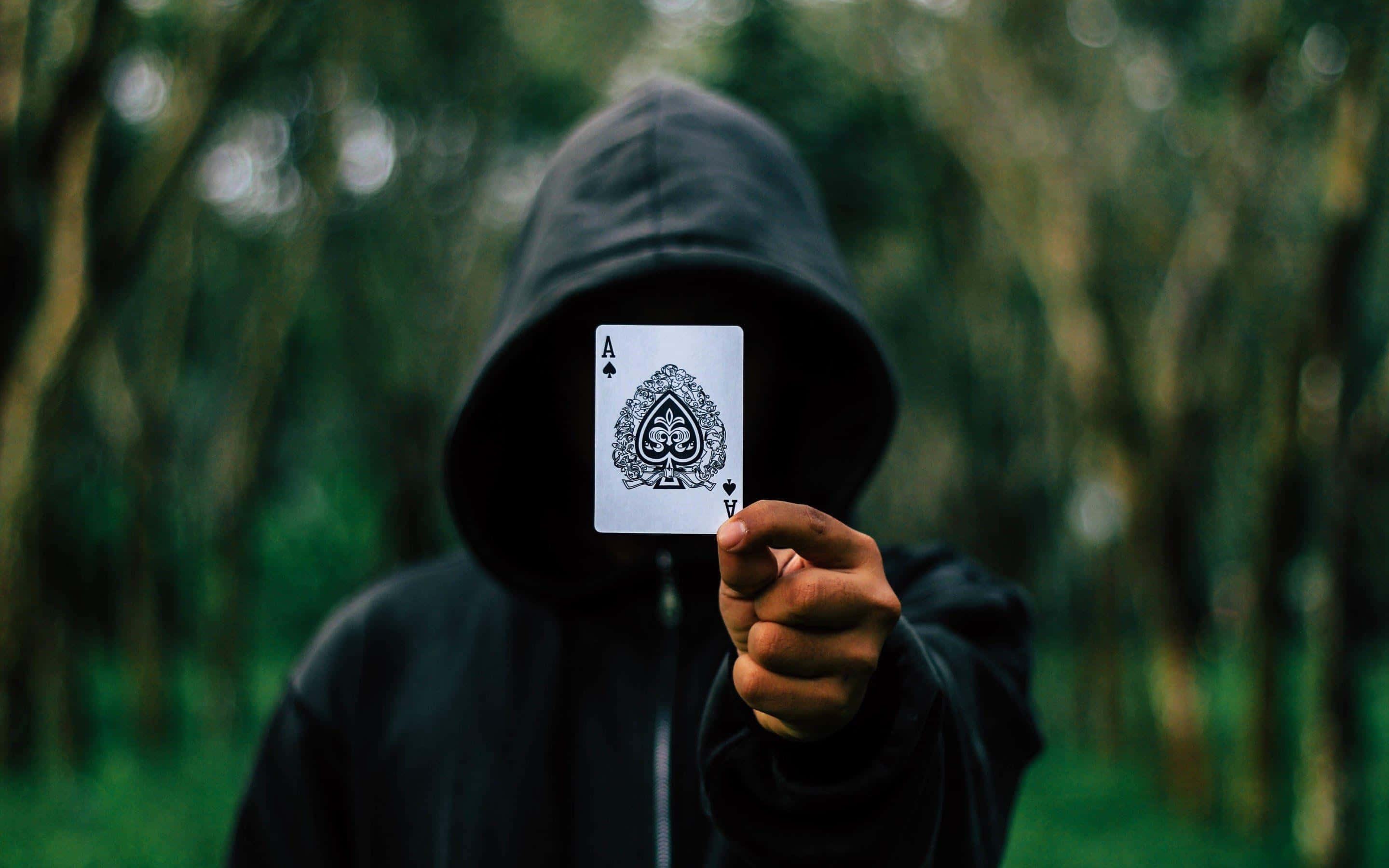 Ace of Spades, hooded figure, forest, 2K Desktop Wallpaper