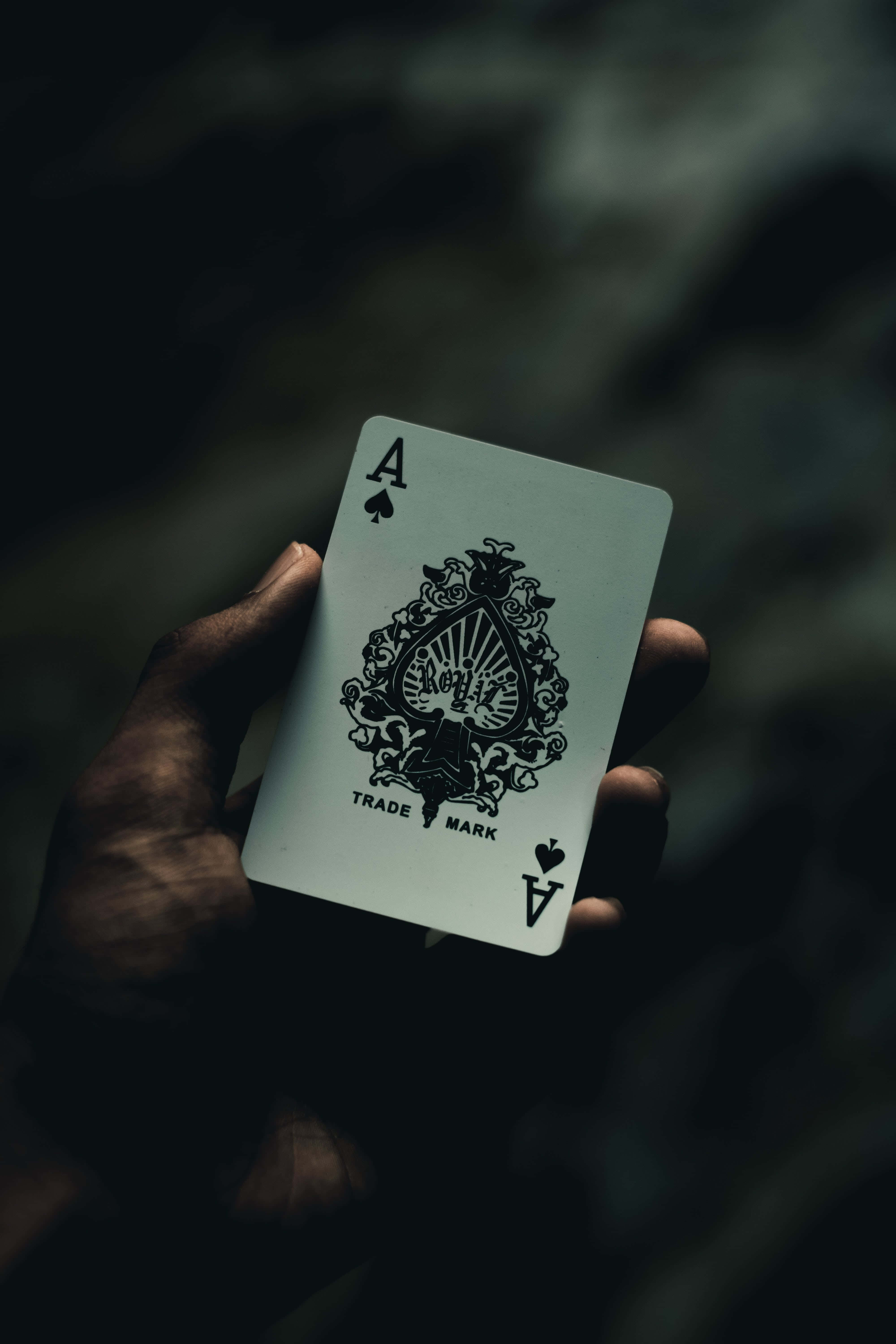 Ace of Spades, hand, dark blurred background, 5K Phone Wallpaper