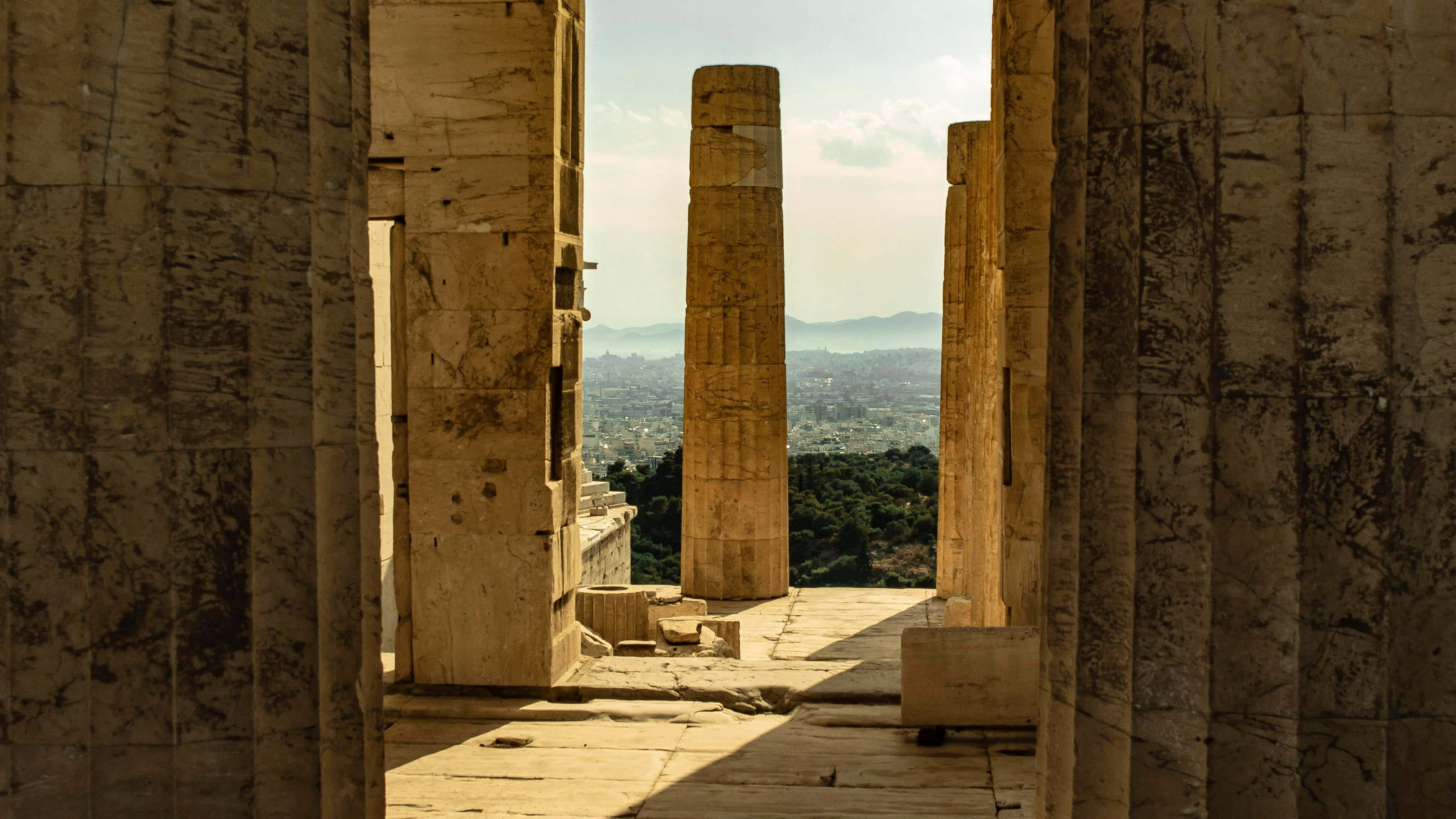 Acropolis, ancient stone columns, sunlit view, 4K Desktop Wallpaper