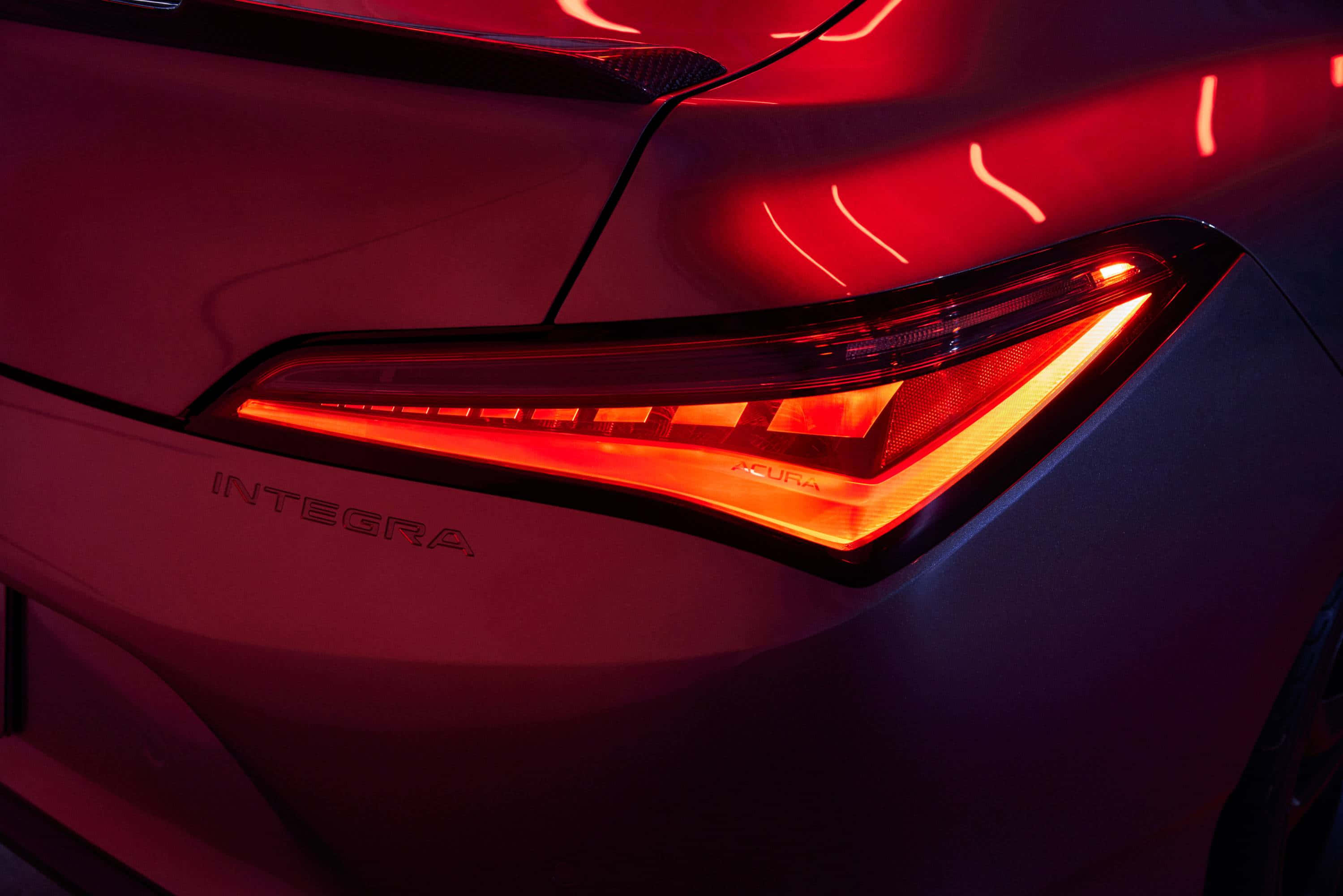 Acura Integra, glowing red taillight, dark background, 2K Desktop Wallpaper