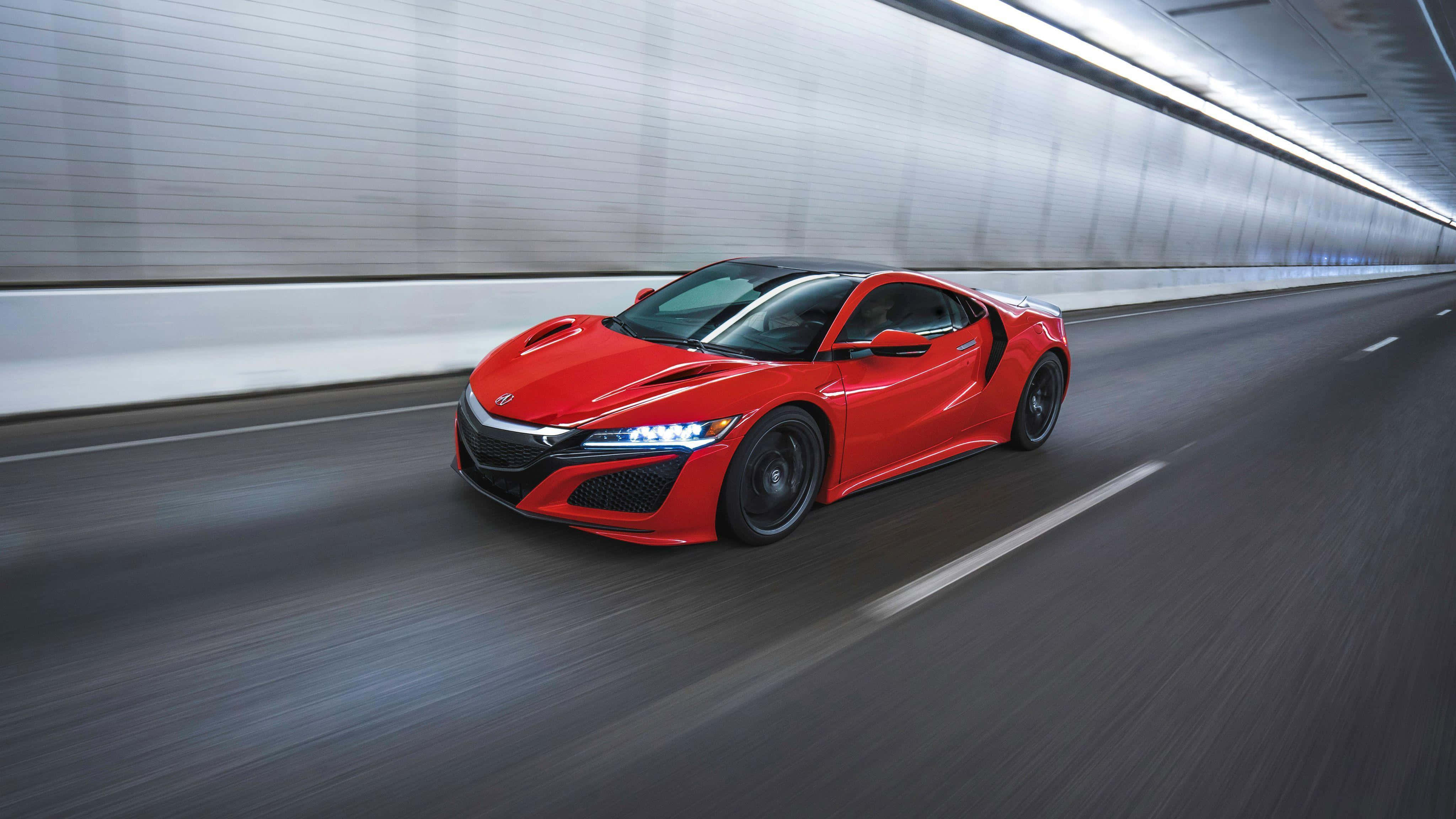 Acura NSX, vibrant red exterior, sleek tunnel, 4K Desktop Wallpaper