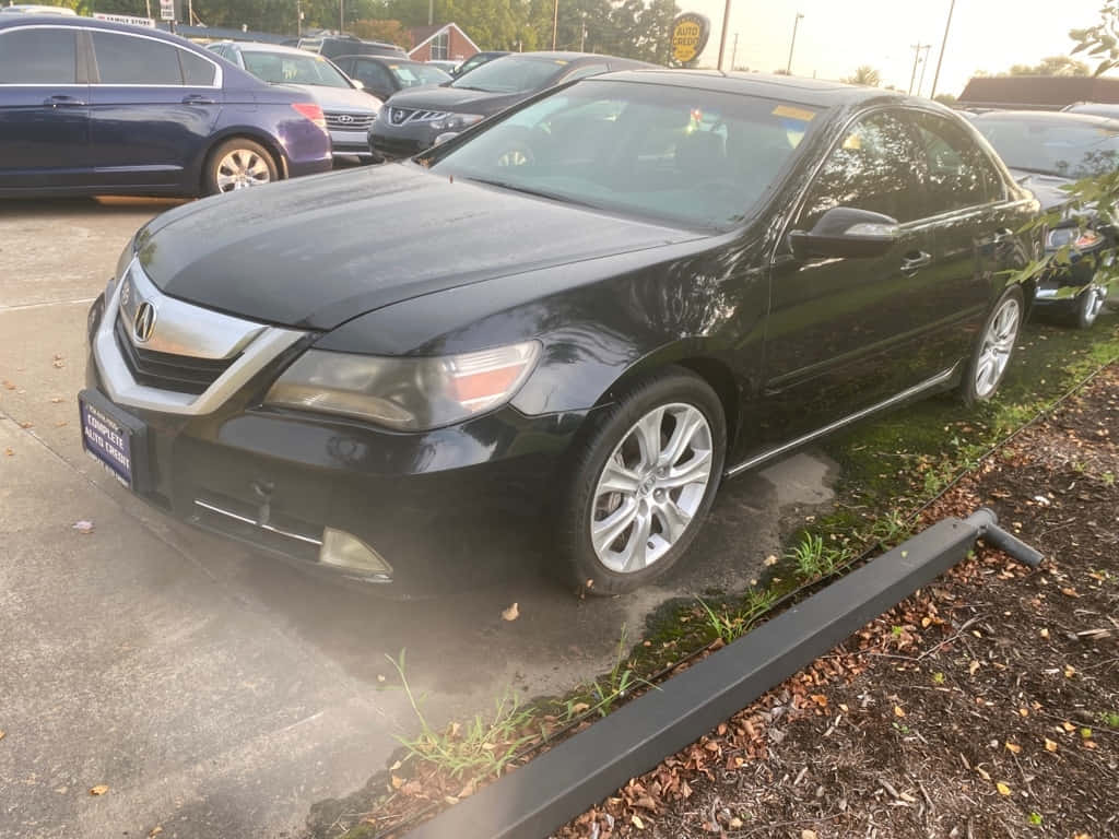 Acura RL, black, wet concrete lot, SD Desktop Wallpaper