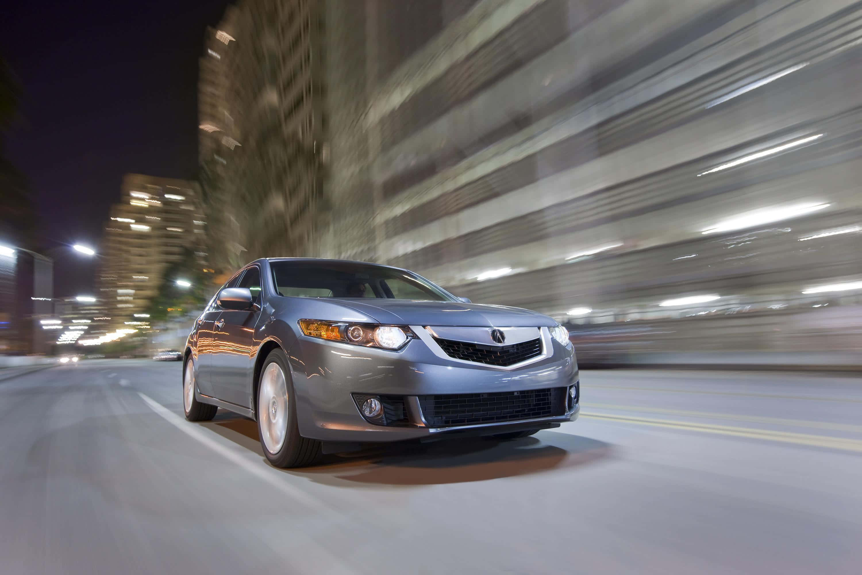 Acura TSX, sleek silver, nighttime cityscape, 2K Desktop Wallpaper