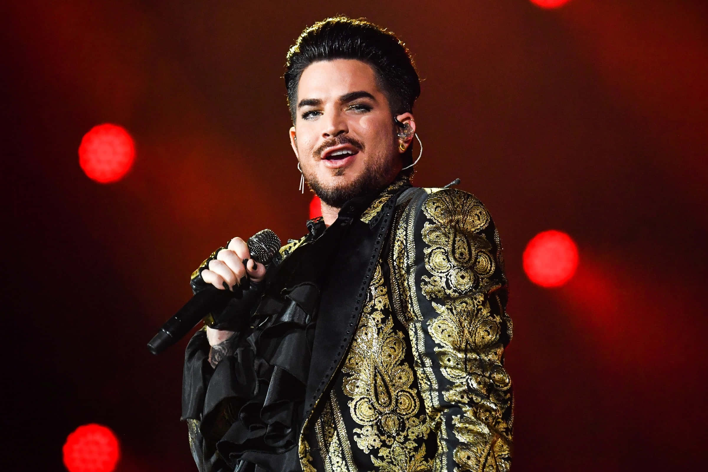 Adam Lambert, black and gold embroidered jacket, red stage lights, Full HD Desktop Wallpaper