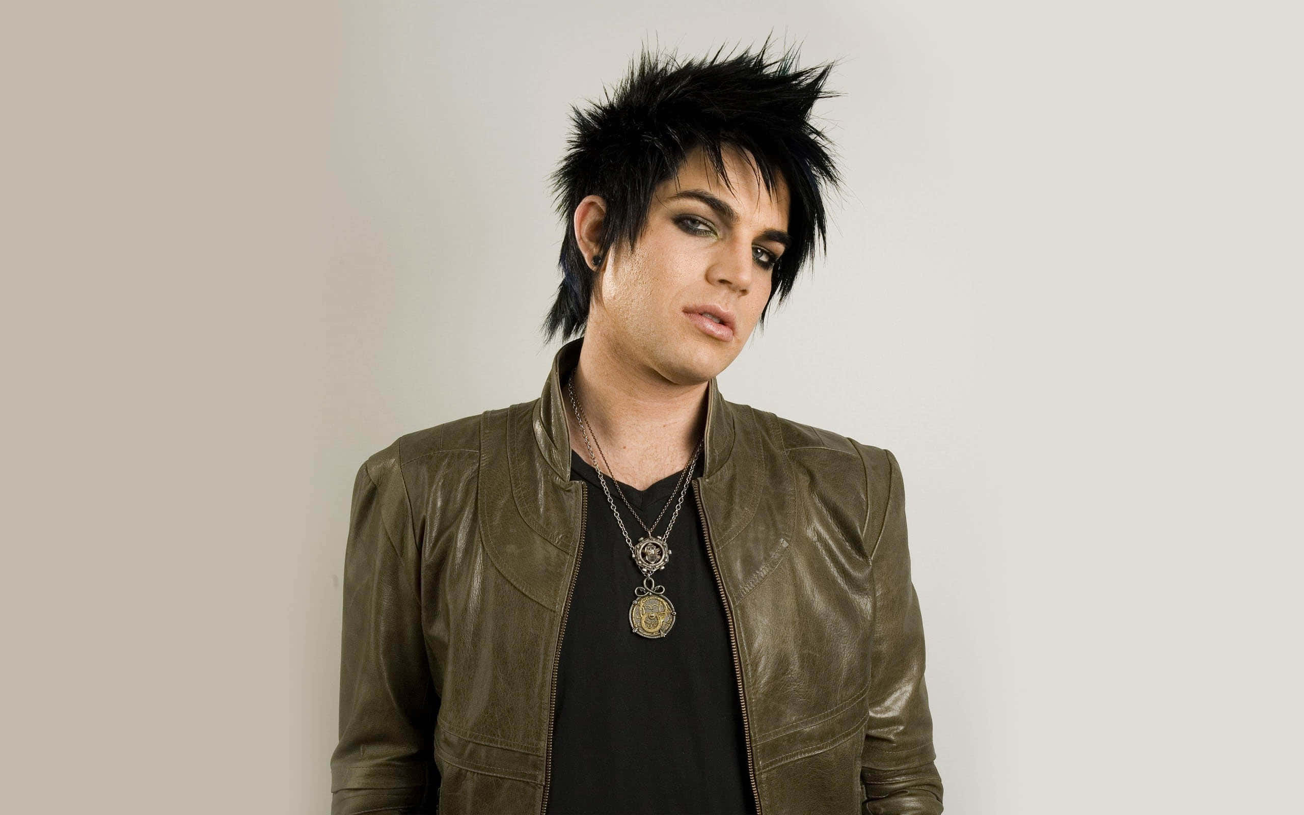 adam lambert, spiky black hair, dark eye makeup, 2K Desktop Wallpaper