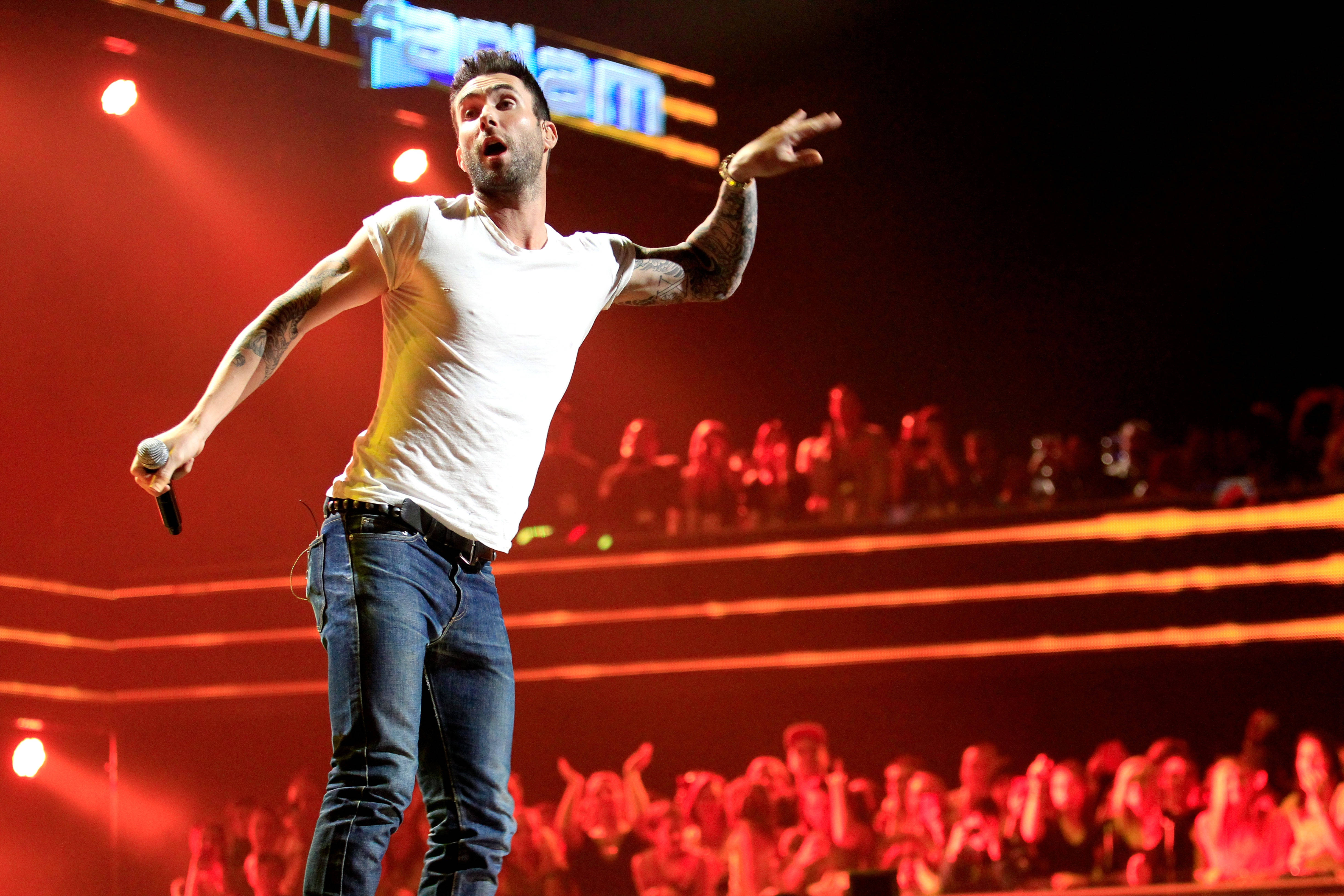 Adam Levine, red-lit stage, cheering crowd, 4K Desktop Wallpaper