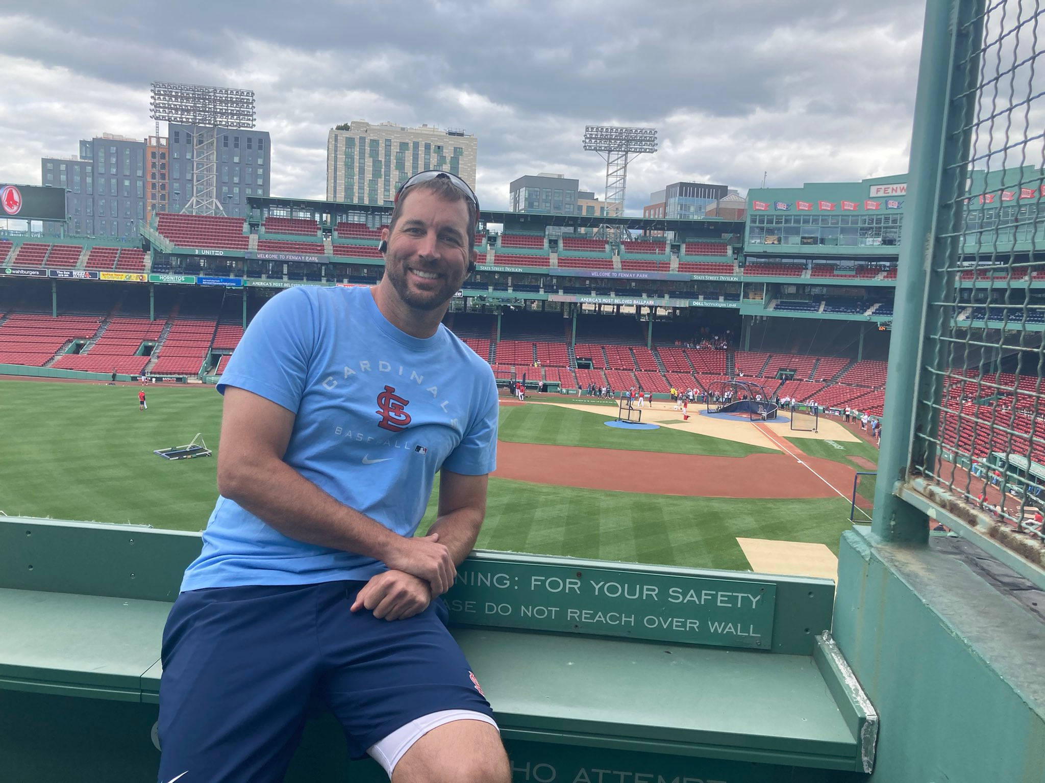 Adam Wainwright, blue Cardinals shirt, green stadium bench, Full HD Desktop Wallpaper