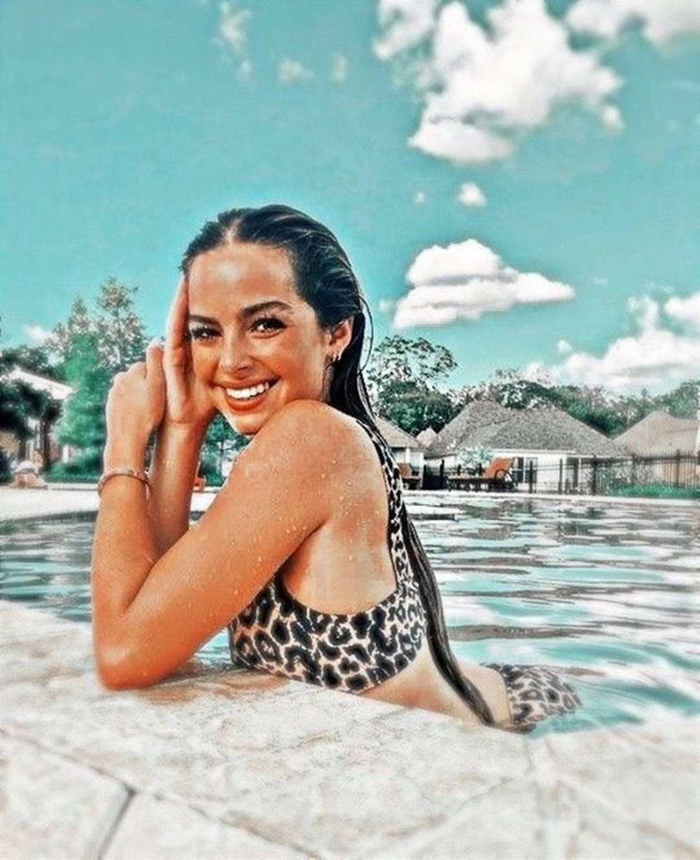 Addison Rae, leopard print swimsuit, pool edge, SD Phone Wallpaper