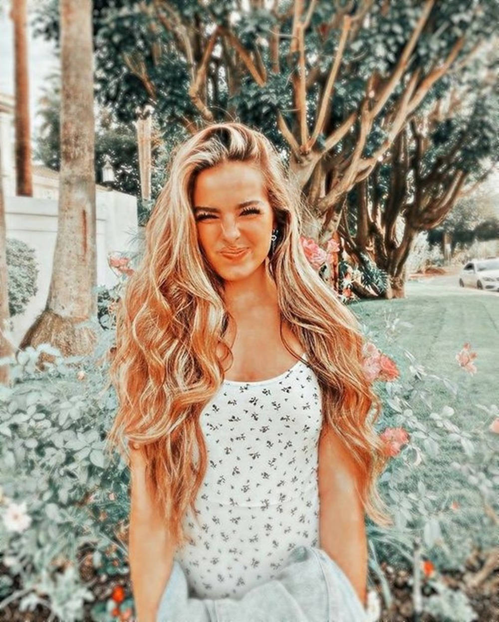Addison Rae, sunlit garden, pink flowers, SD Phone Wallpaper