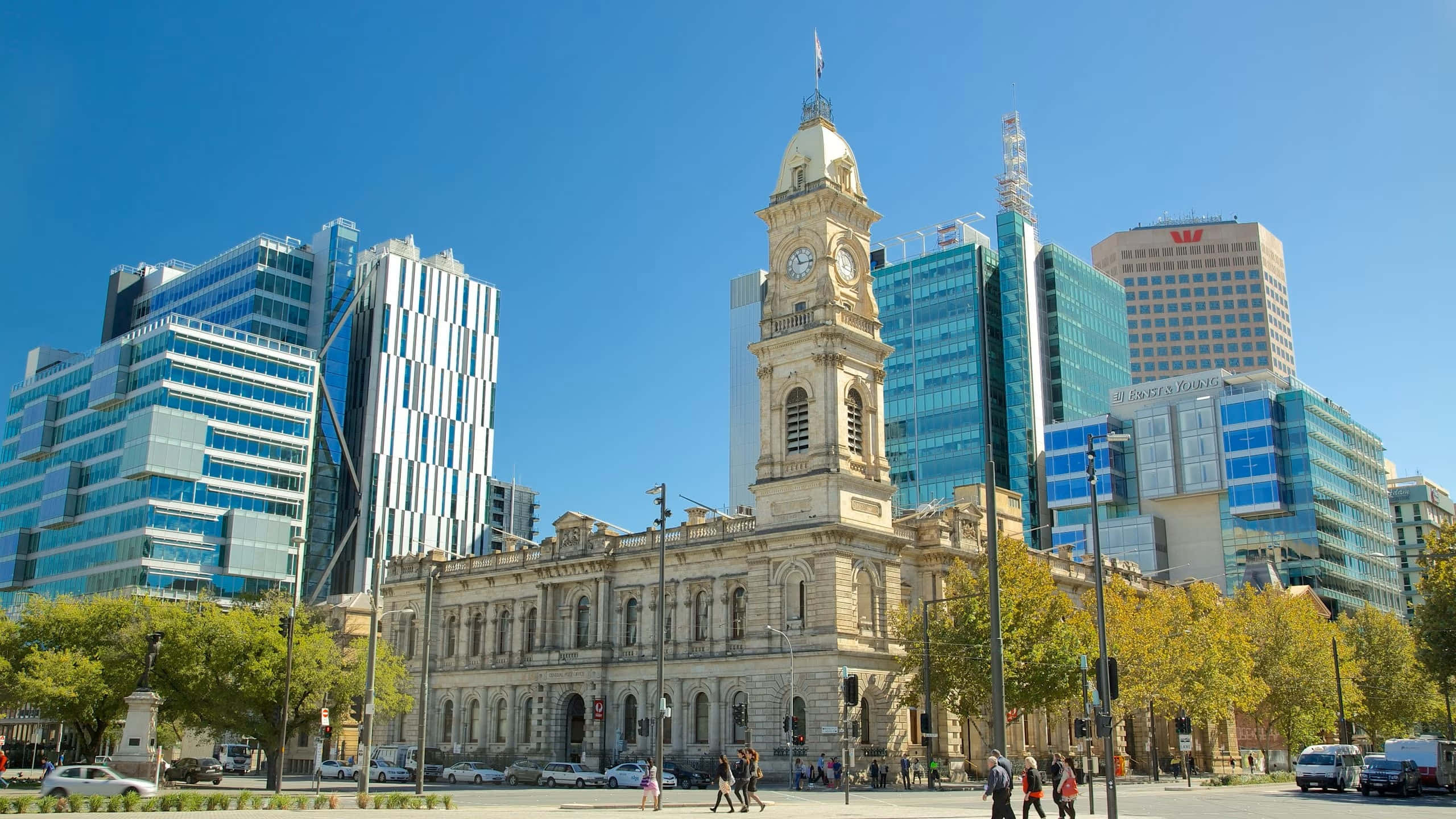 Adelaide Victoria Square, historic clock tower, modern glass skyscrapers, 2K Desktop Wallpaper