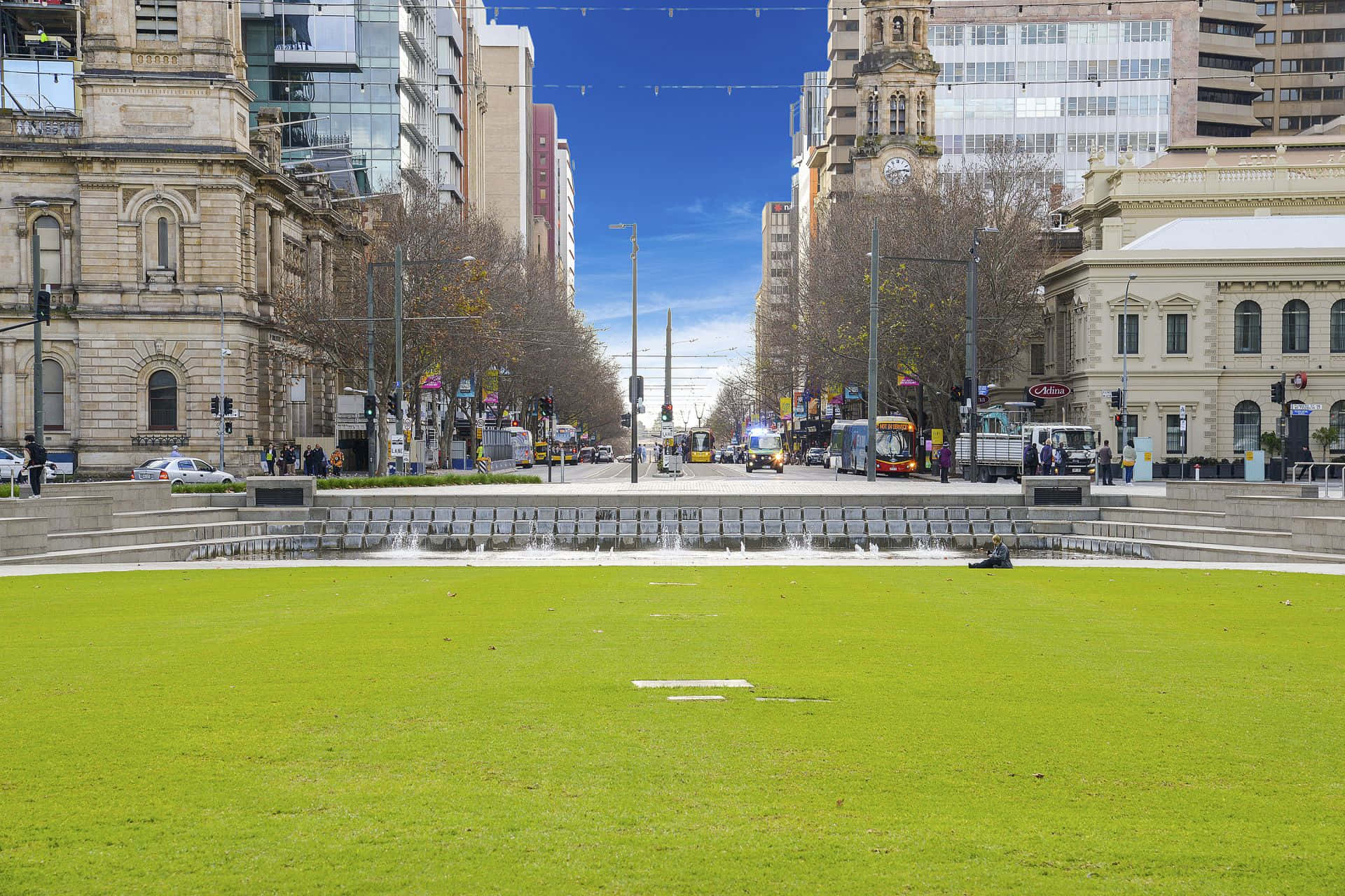 Adelaide Victoria Square, vibrant green lawn, bustling city street, Full HD Desktop Wallpaper
