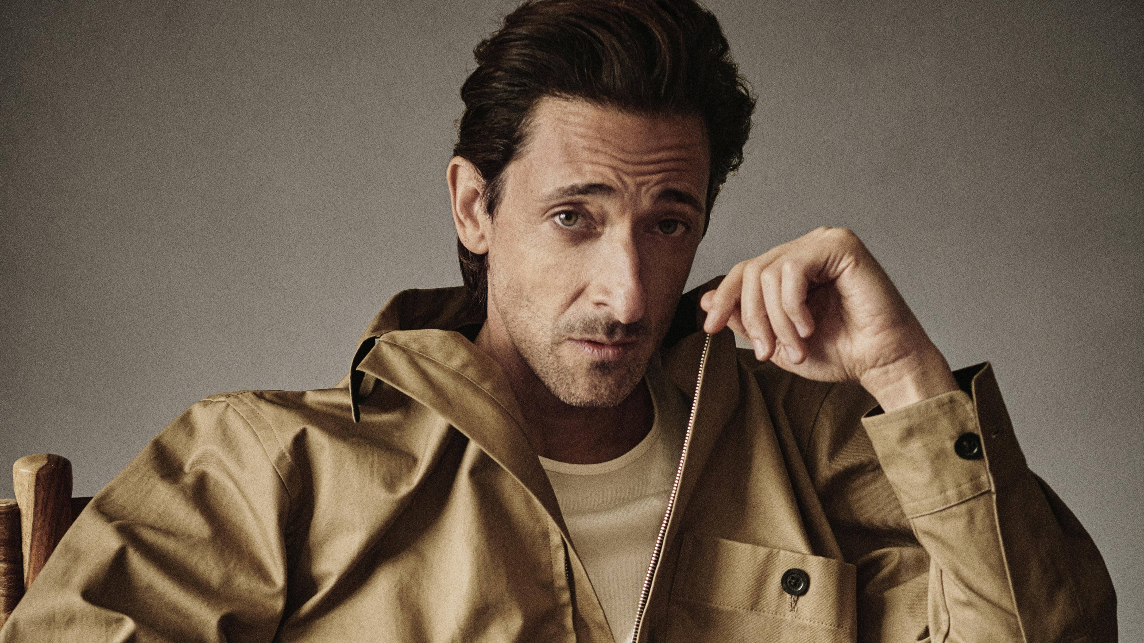 Adrien Brody, tan jacket, muted gray background, 4K Desktop Wallpaper