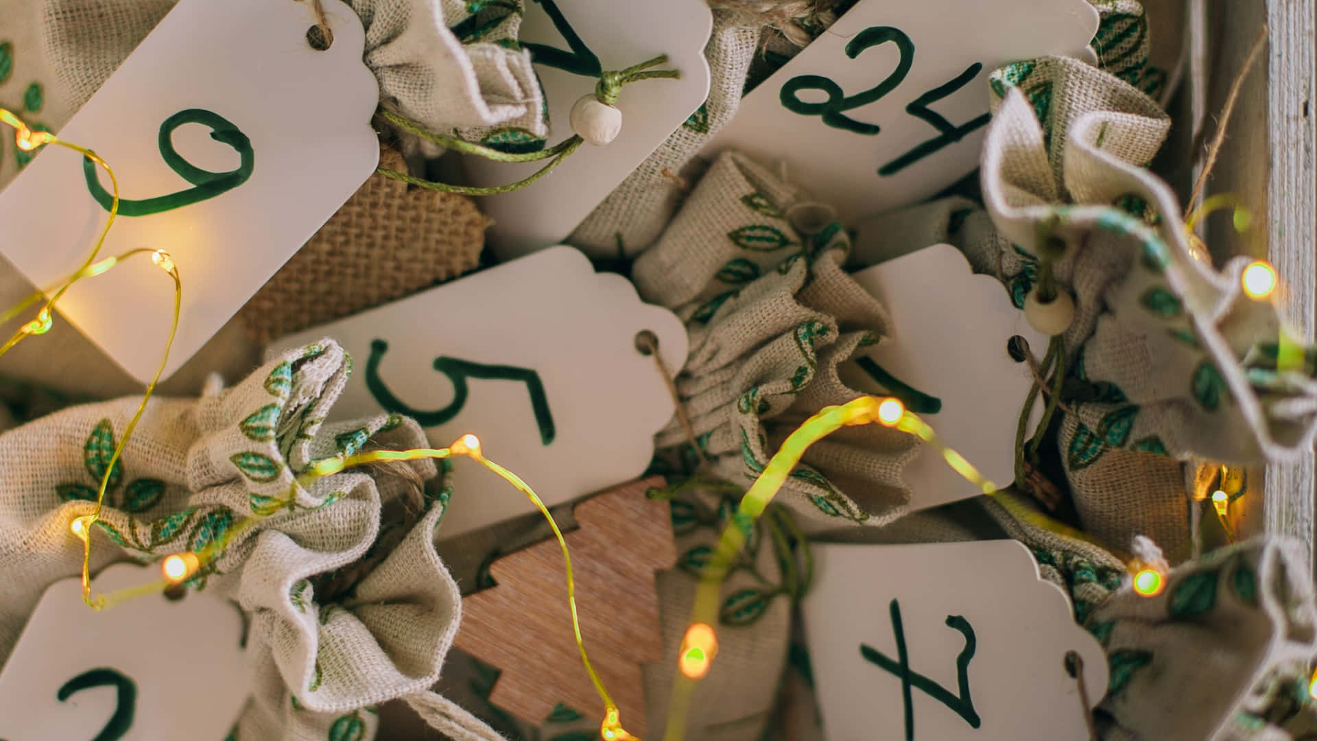 Advent Calendar, green leaf embroidery, warm fairy lights, Full HD Desktop Wallpaper