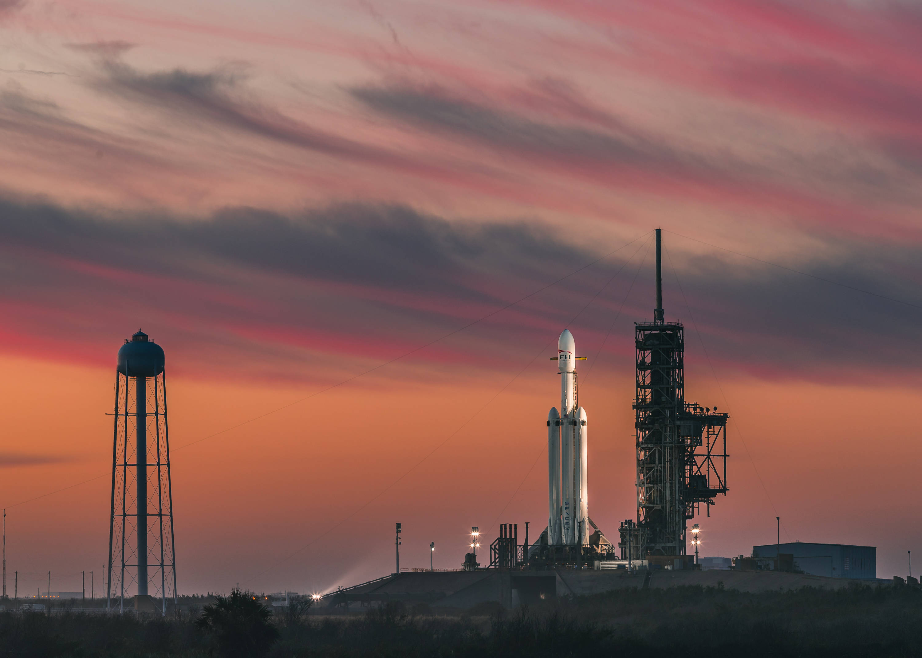 rocket, launchpad, pink and orange sunset sky, 2K Desktop Wallpaper