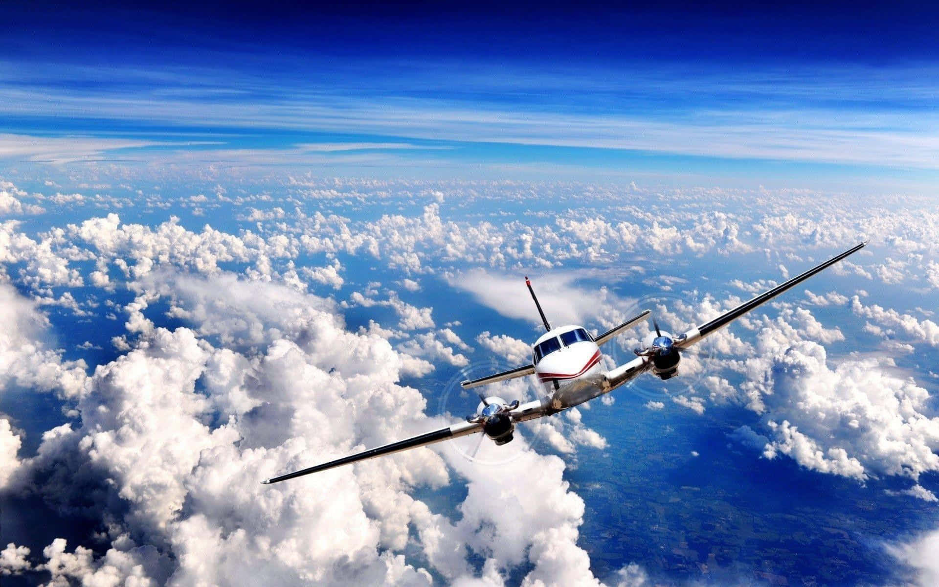 vintage propeller airplane, fluffy white clouds, vibrant blue sky, Full HD Desktop Wallpaper