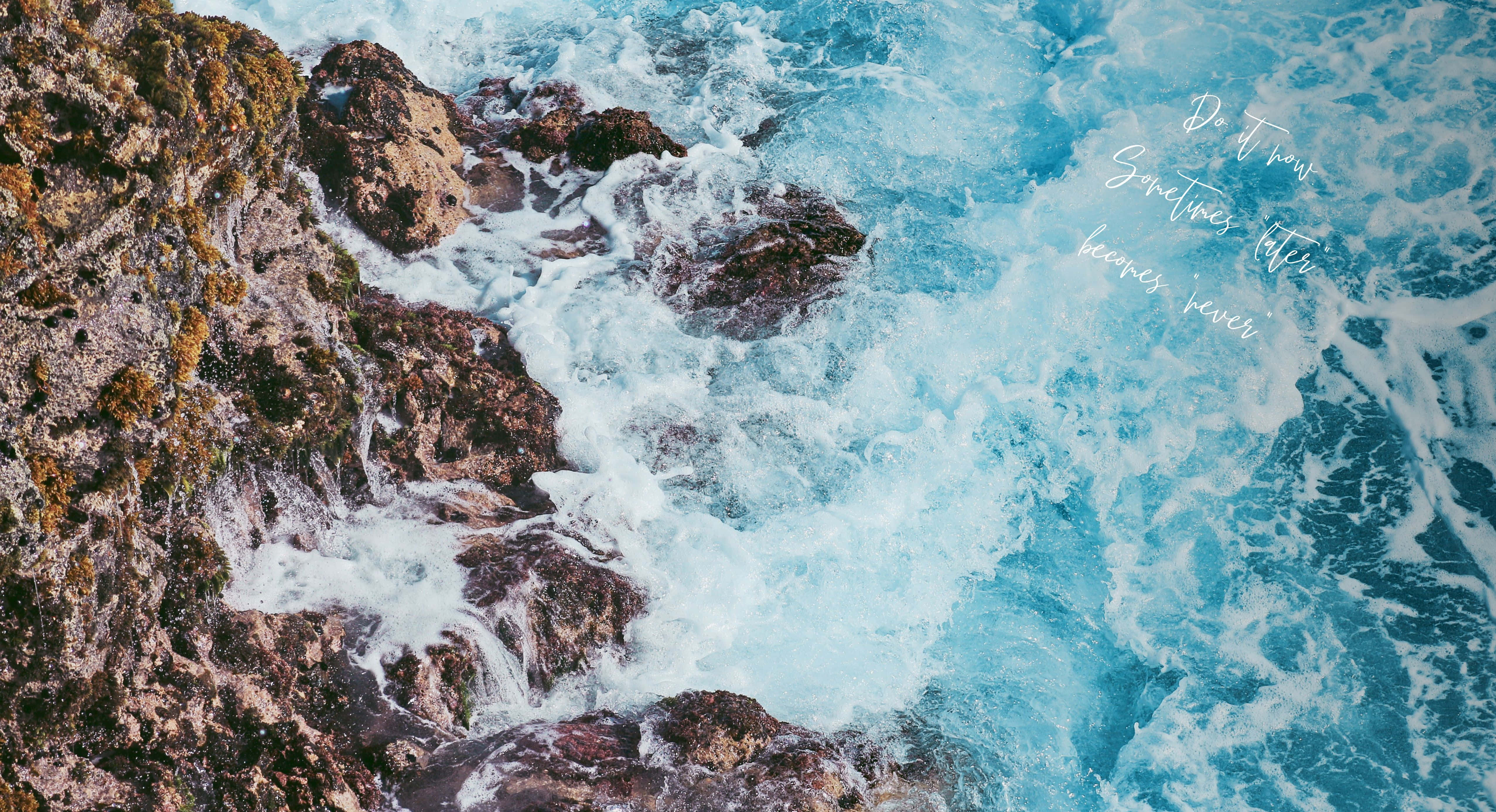 Aesthetic Beach Laptop, turquoise ocean waves, rugged mossy cliffs, 4K Desktop Wallpaper