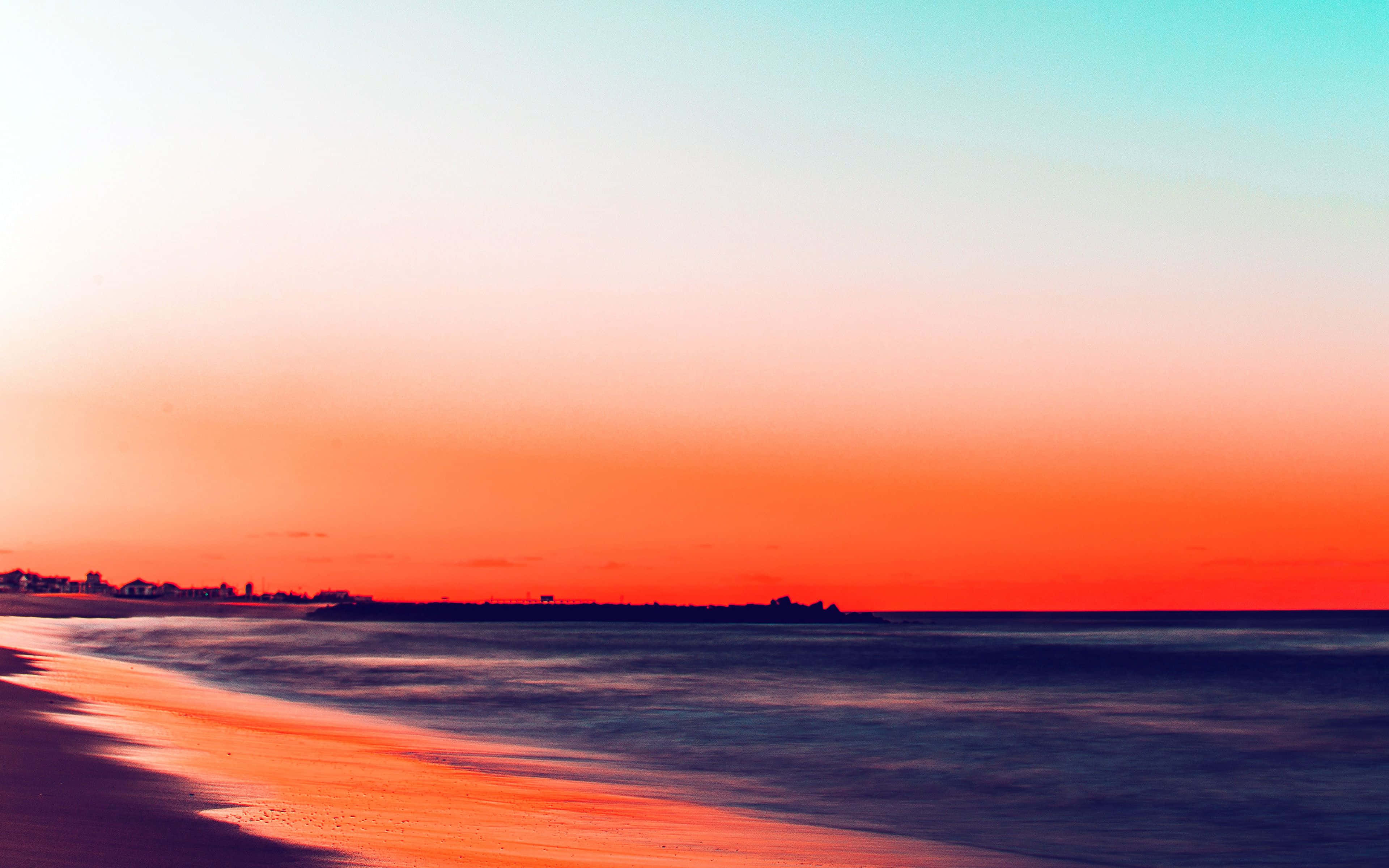 sunset, vibrant orange and teal skies, calm waters, 4K Desktop Wallpaper