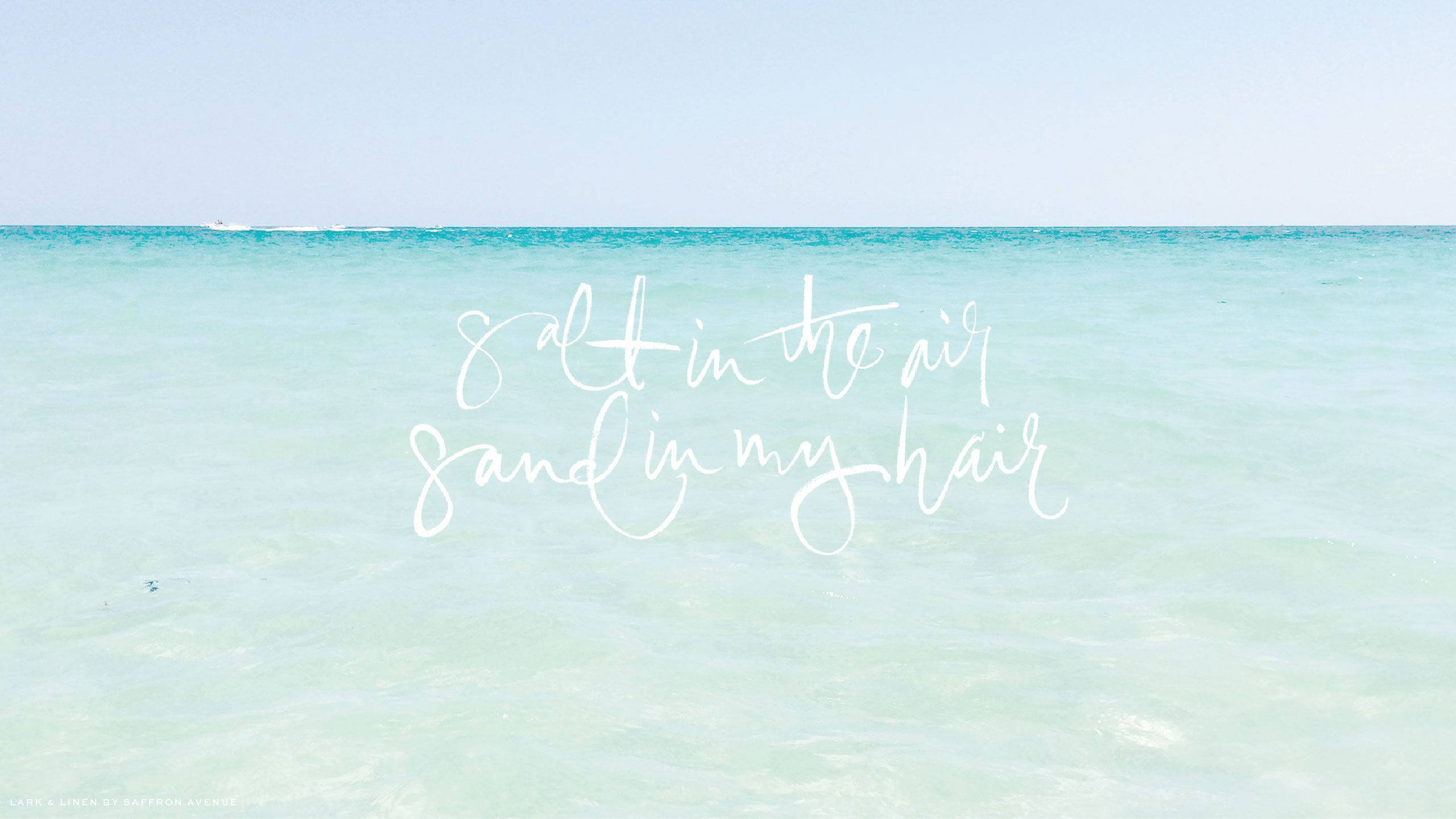 turquoise ocean, pale sky, white script, 2K Desktop Wallpaper