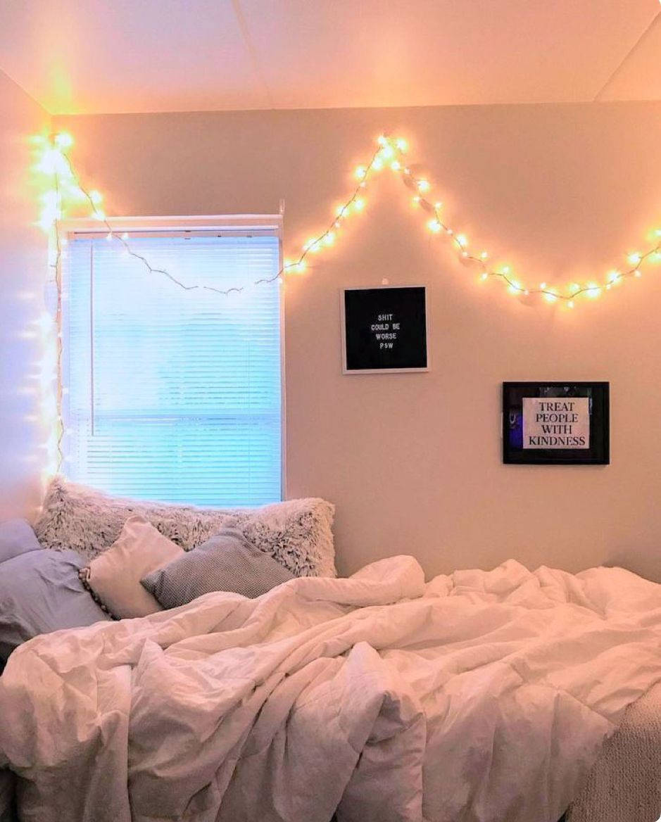warm string lights, messy bed, motivational wall art, SD Phone Wallpaper