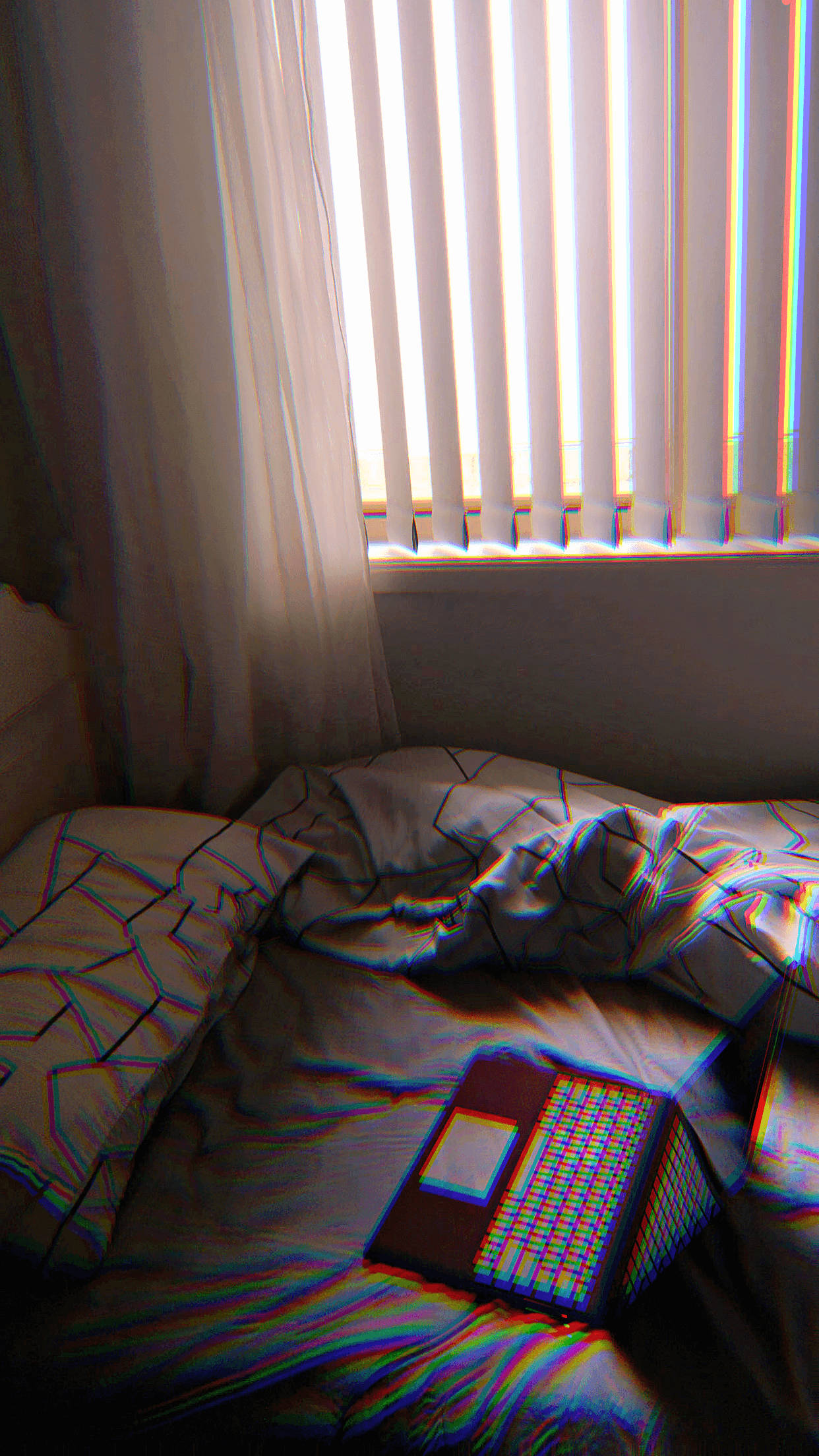 laptop, rumpled geometric-patterned bedsheet, warm window light, Full HD Phone Wallpaper