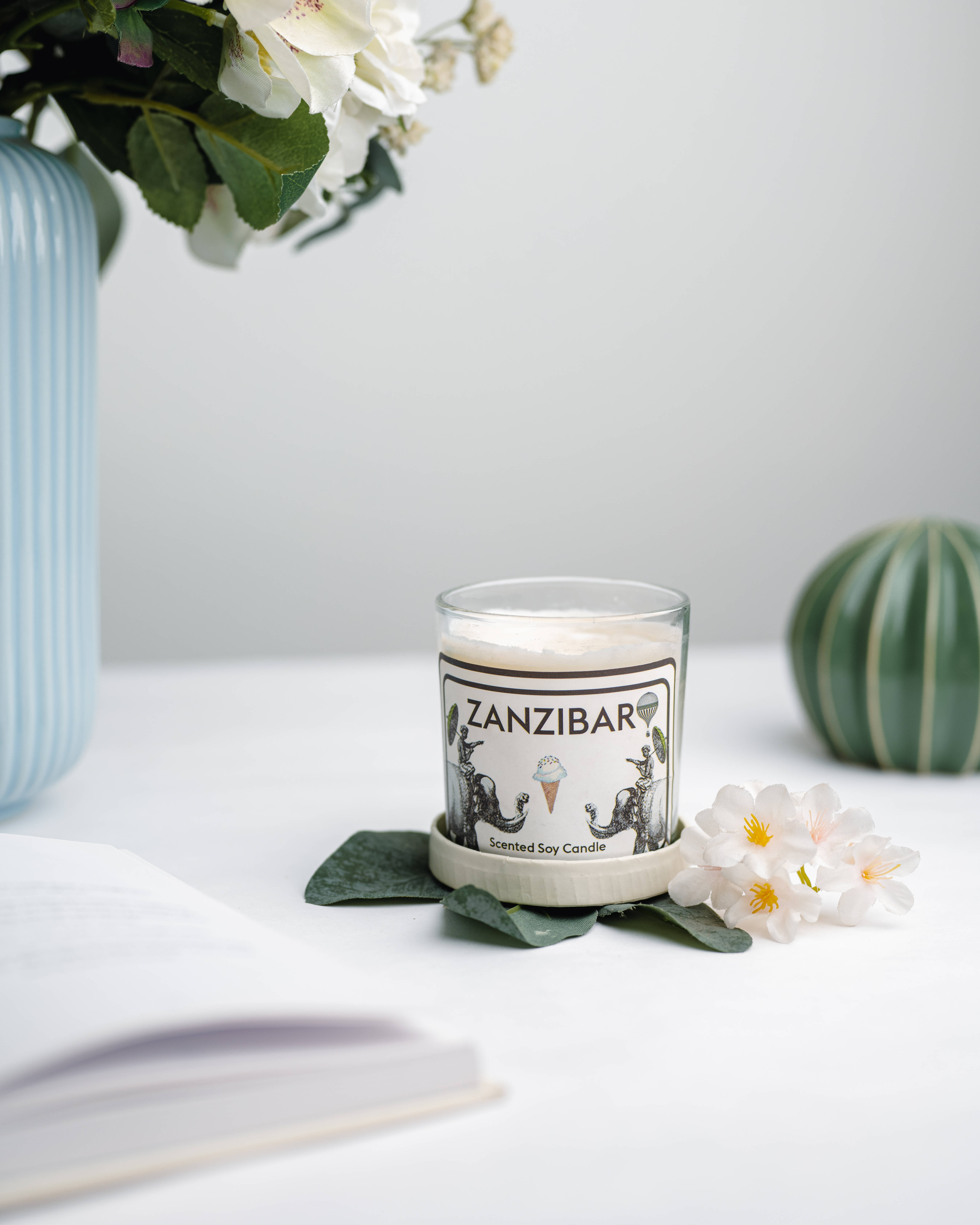 Zanzibar scented soy candle, green leaves, white flowers, 5K Phone Wallpaper