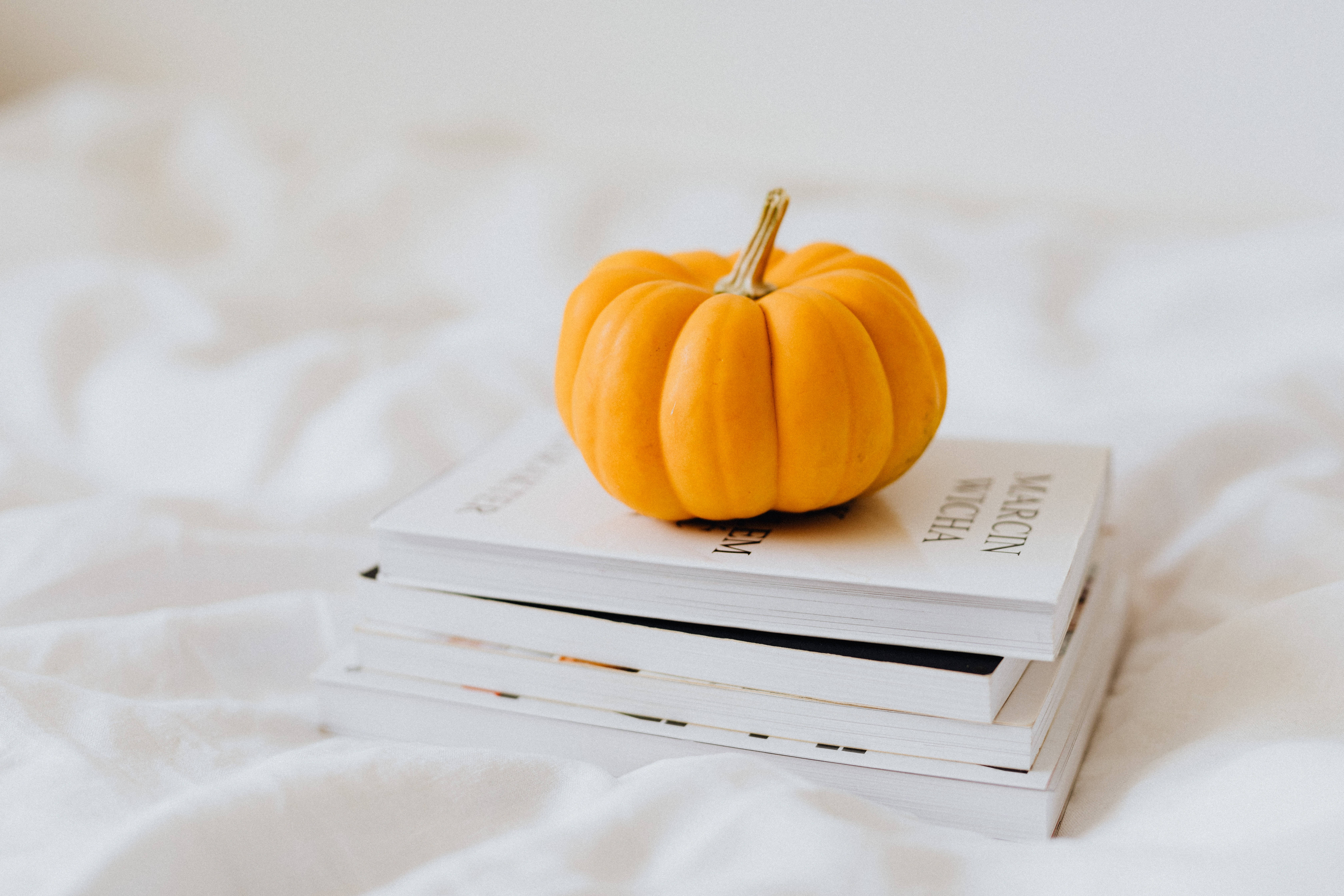 pumpkin, orange, white books, 5K Desktop Wallpaper
