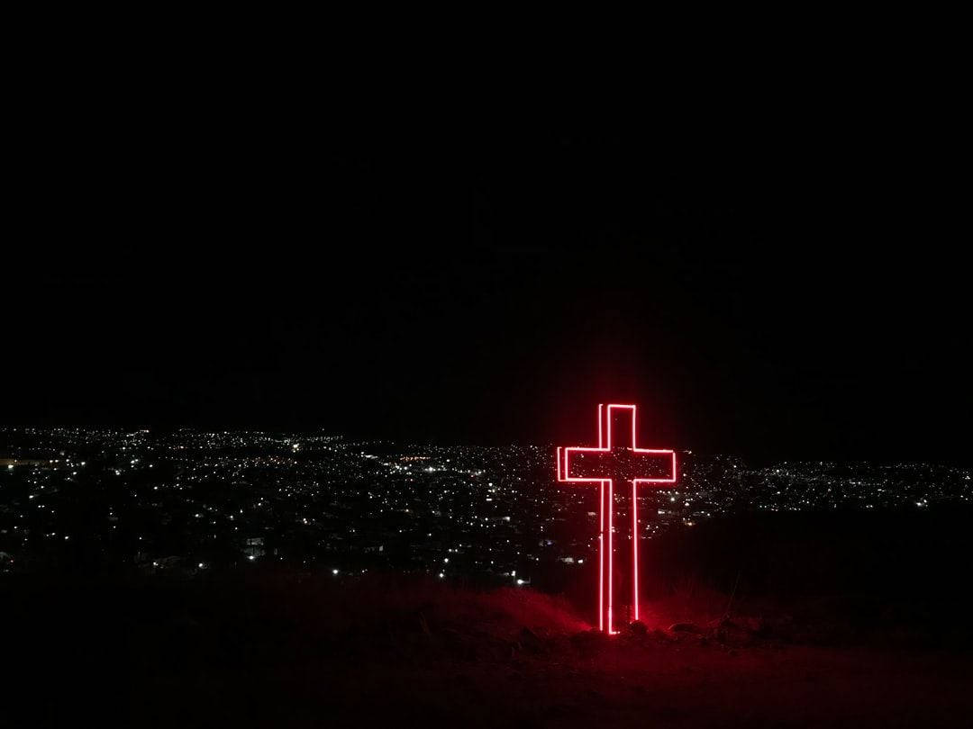 glowing red neon cross, hill, sprawling cityscape, SD Desktop Wallpaper