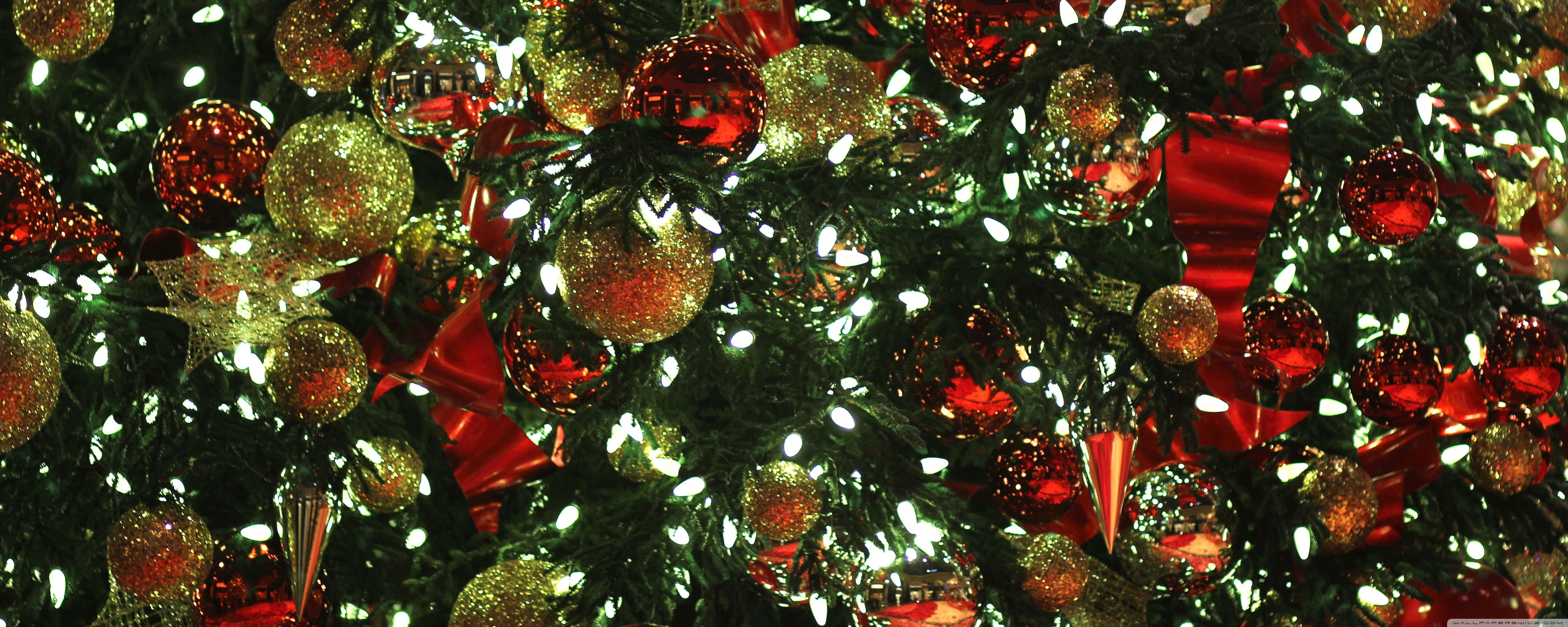 silver laptop, festive Christmas lights, lush green Christmas tree, 5K Desktop Wallpaper