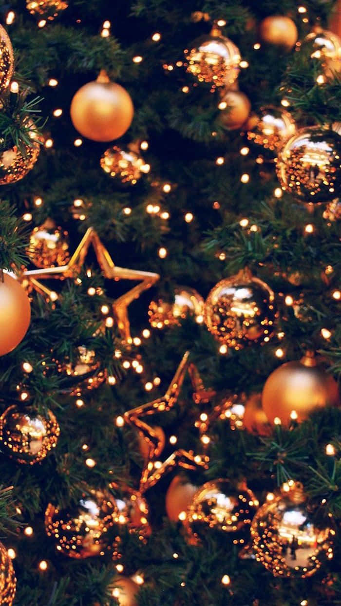 gold ornaments, twinkling fairy lights, lush green Christmas tree, SD Phone Wallpaper