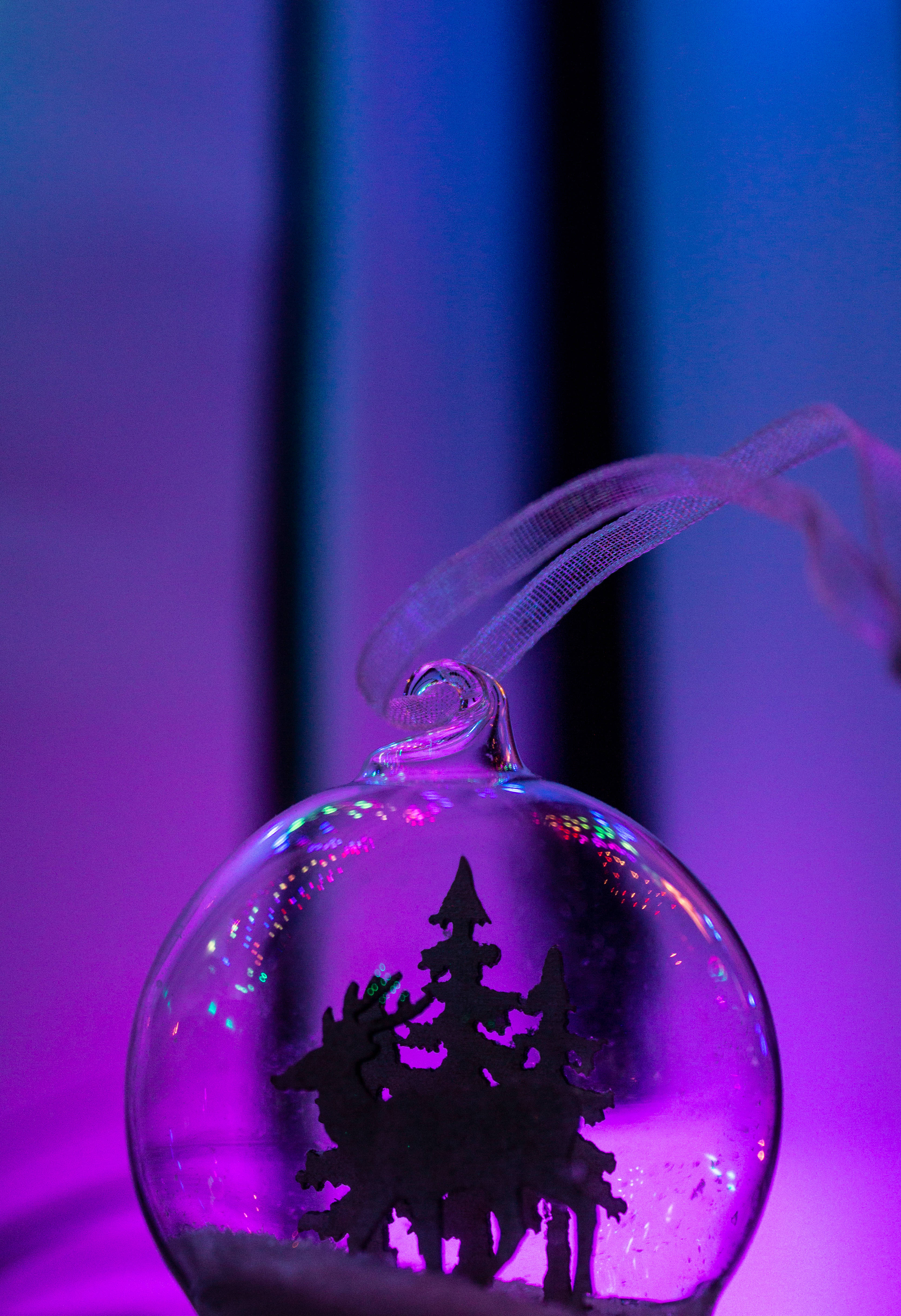 Merry Christmas Glass Bauble, tree silhouette, purple and blue lights, 4K Phone Wallpaper