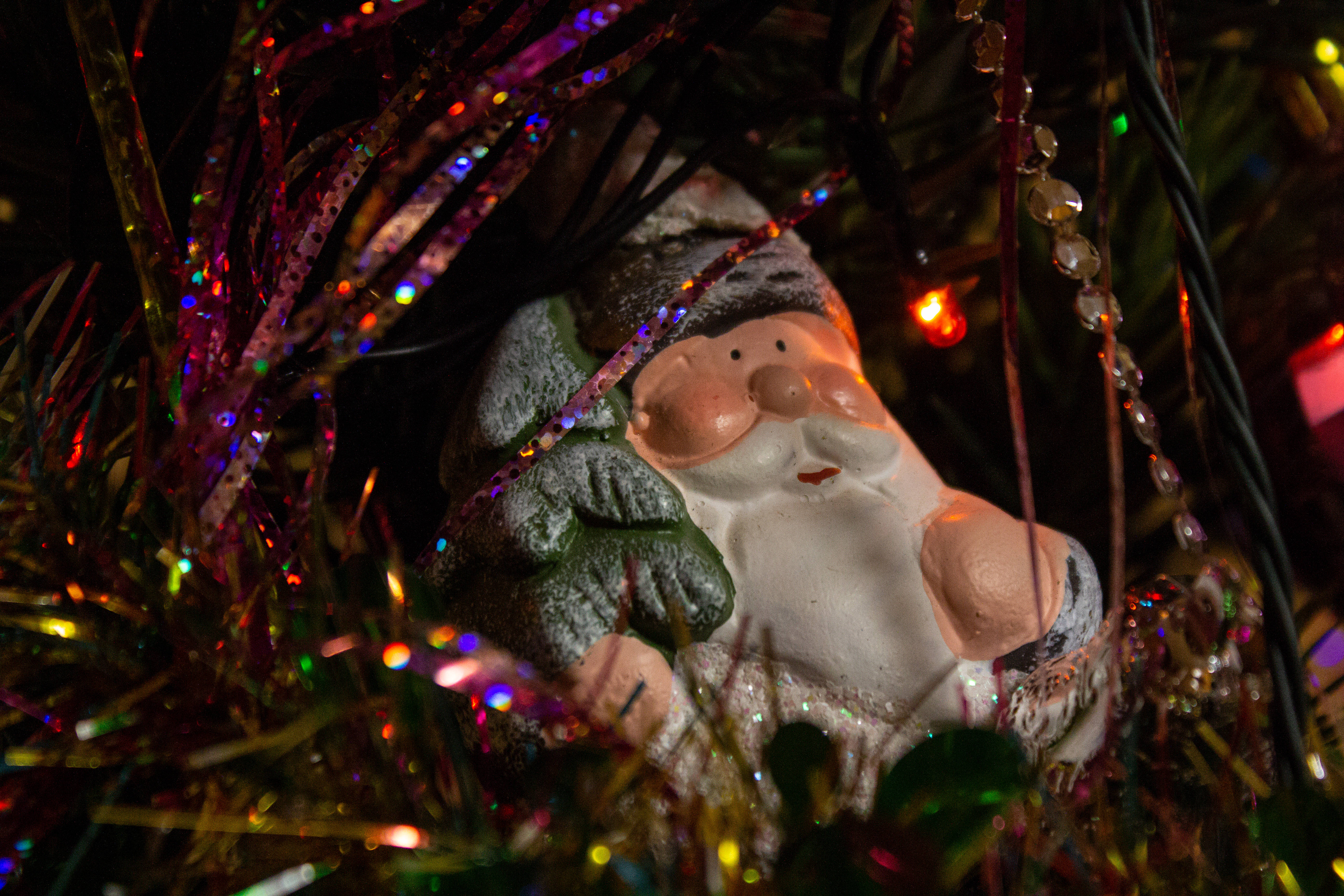 Aesthetic Santa Christmas Ornament, ceramic Santa Claus figurine, glittering tinsel and beads, 5K Desktop Wallpaper
