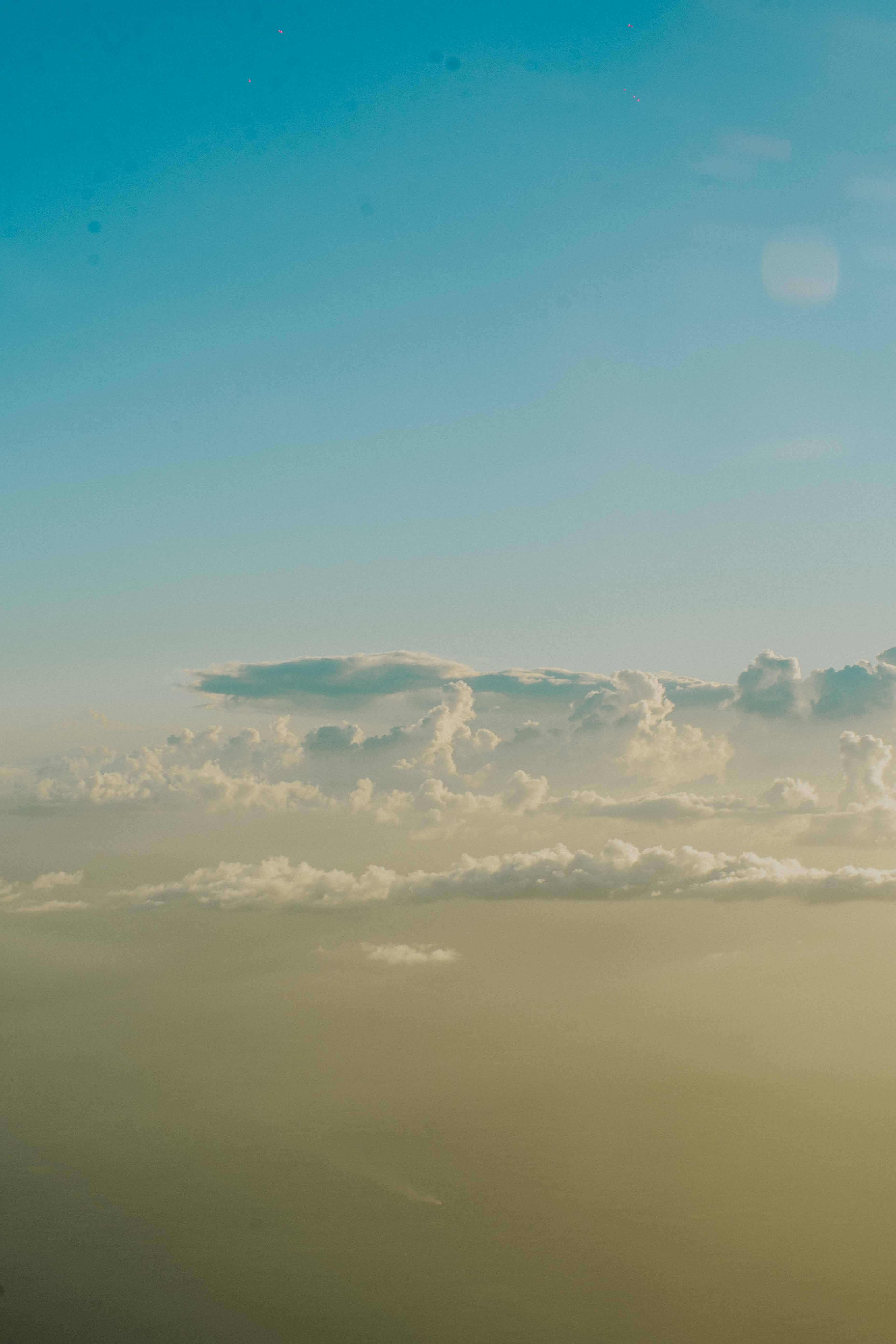 Green Blue Cloud iPhone, golden light, clear blue expanse, 5K Phone Wallpaper
