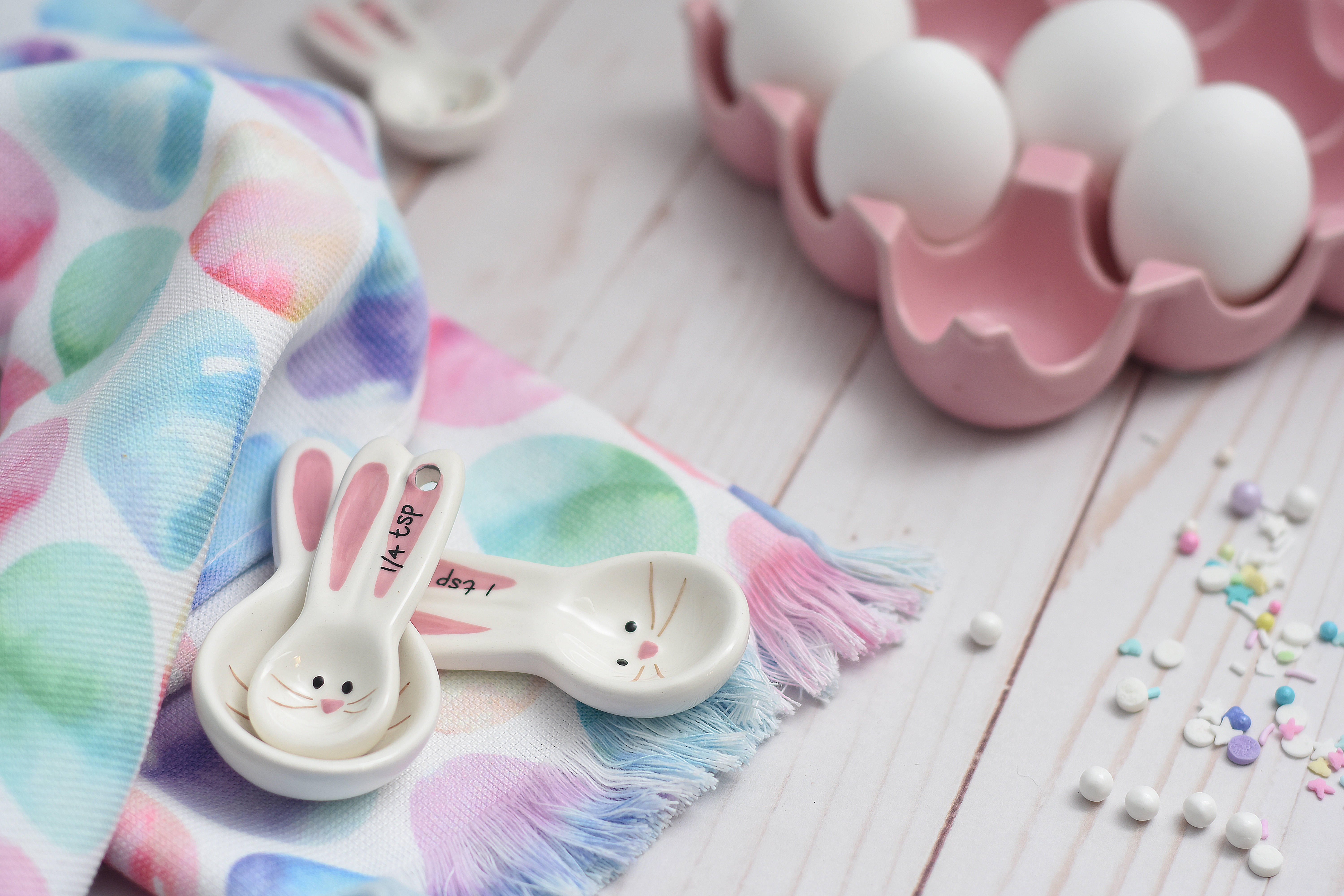 bunny-themed measuring spoons, pastel polka-dot cloth, pink egg carton, 5K Desktop Wallpaper