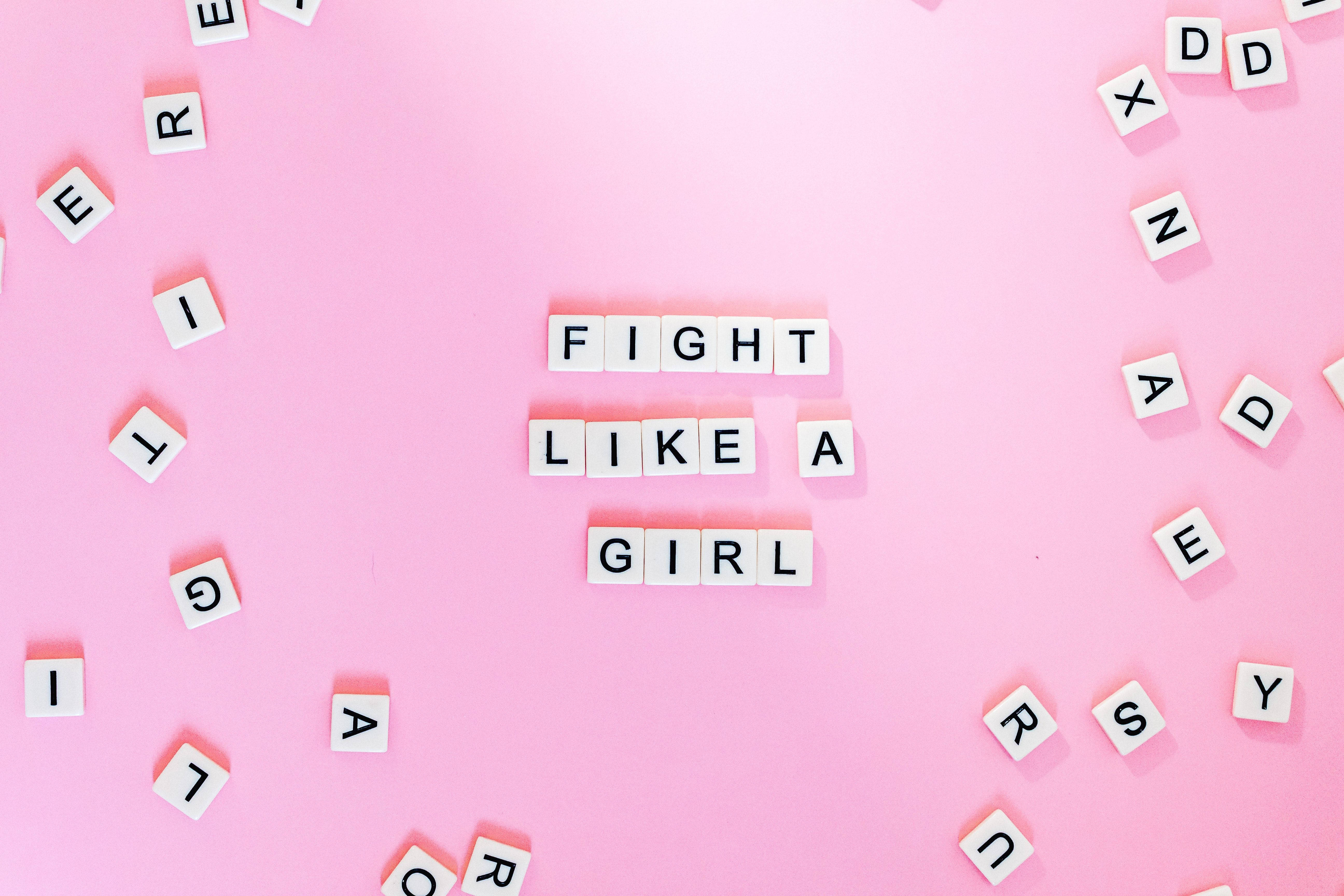 FIGHT LIKE A GIRL, white letter tiles, soft pink background, 5K Desktop Wallpaper