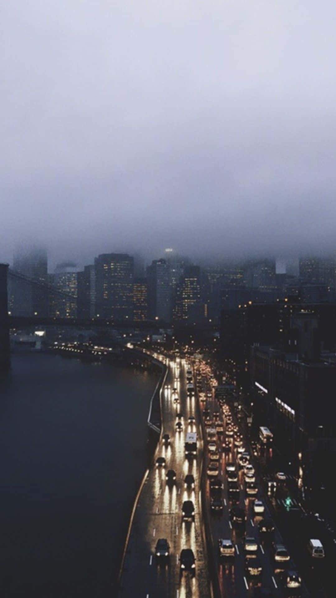 rain-slicked city highway, dusk, glowing car headlights, Full HD Phone Wallpaper