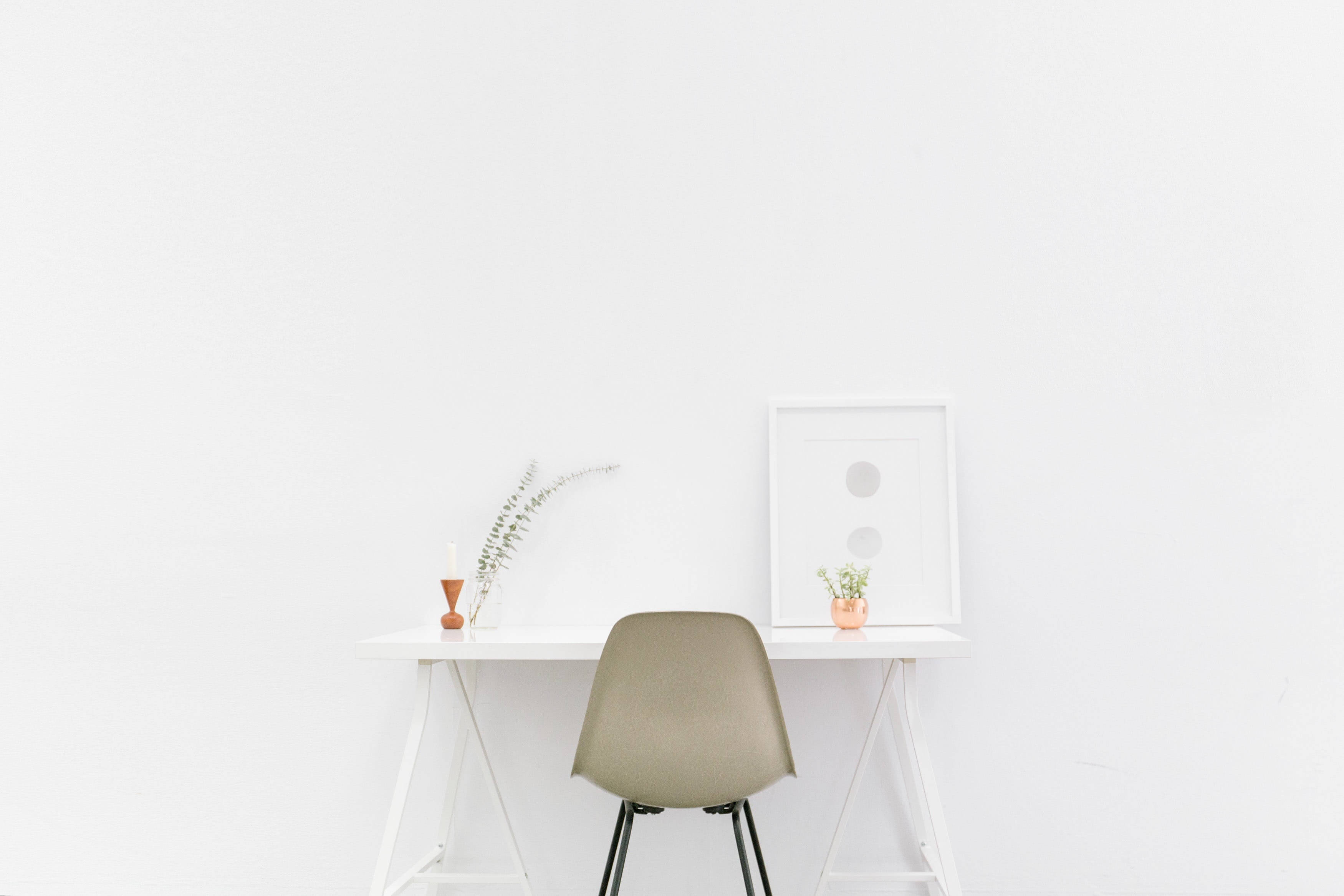 plain white aesthetic home corner, minimalist white desk, olive chair, 2K Desktop Wallpaper