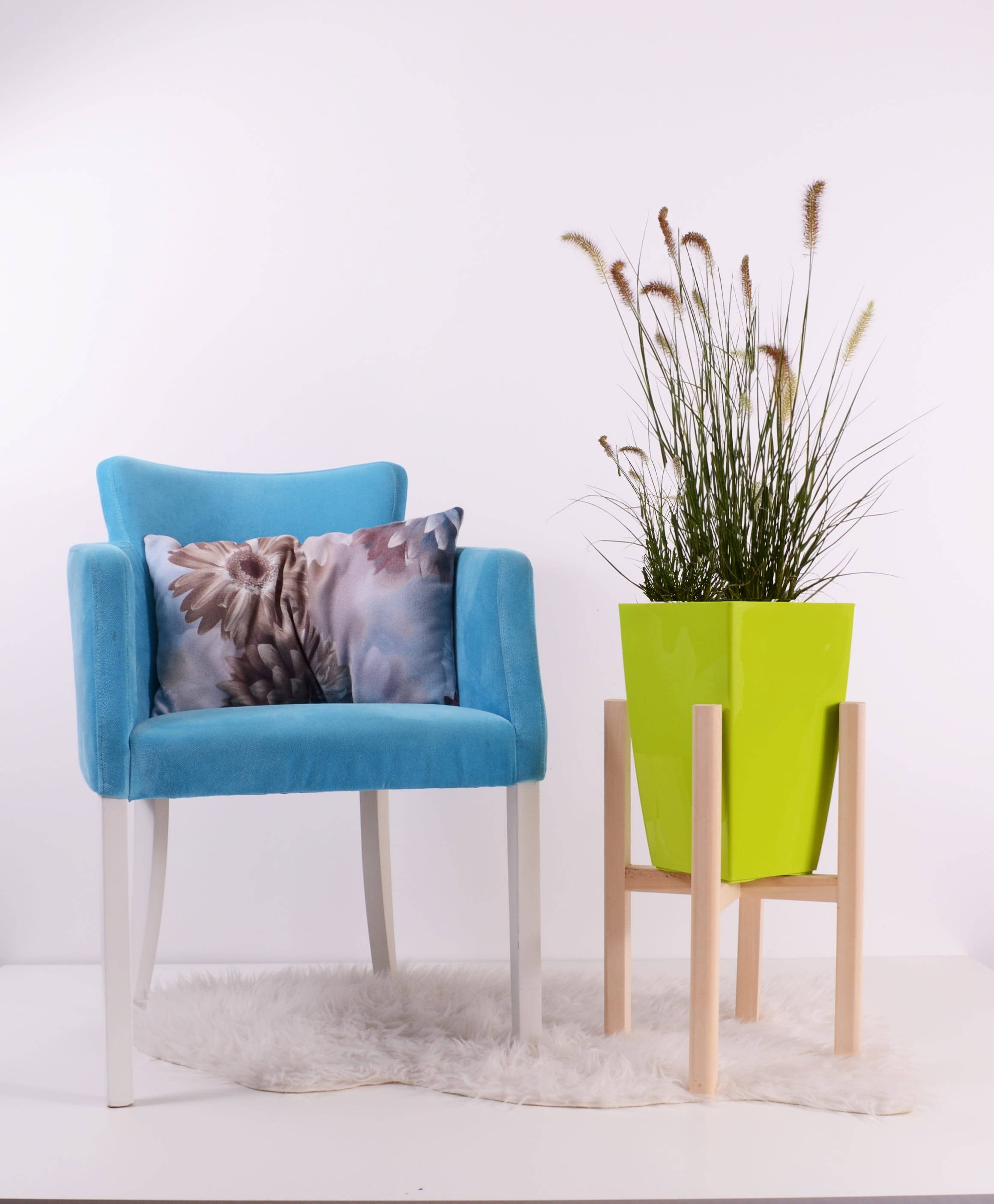 bright blue velvet armchair, floral pillow, lime green planter, 2K Phone Wallpaper