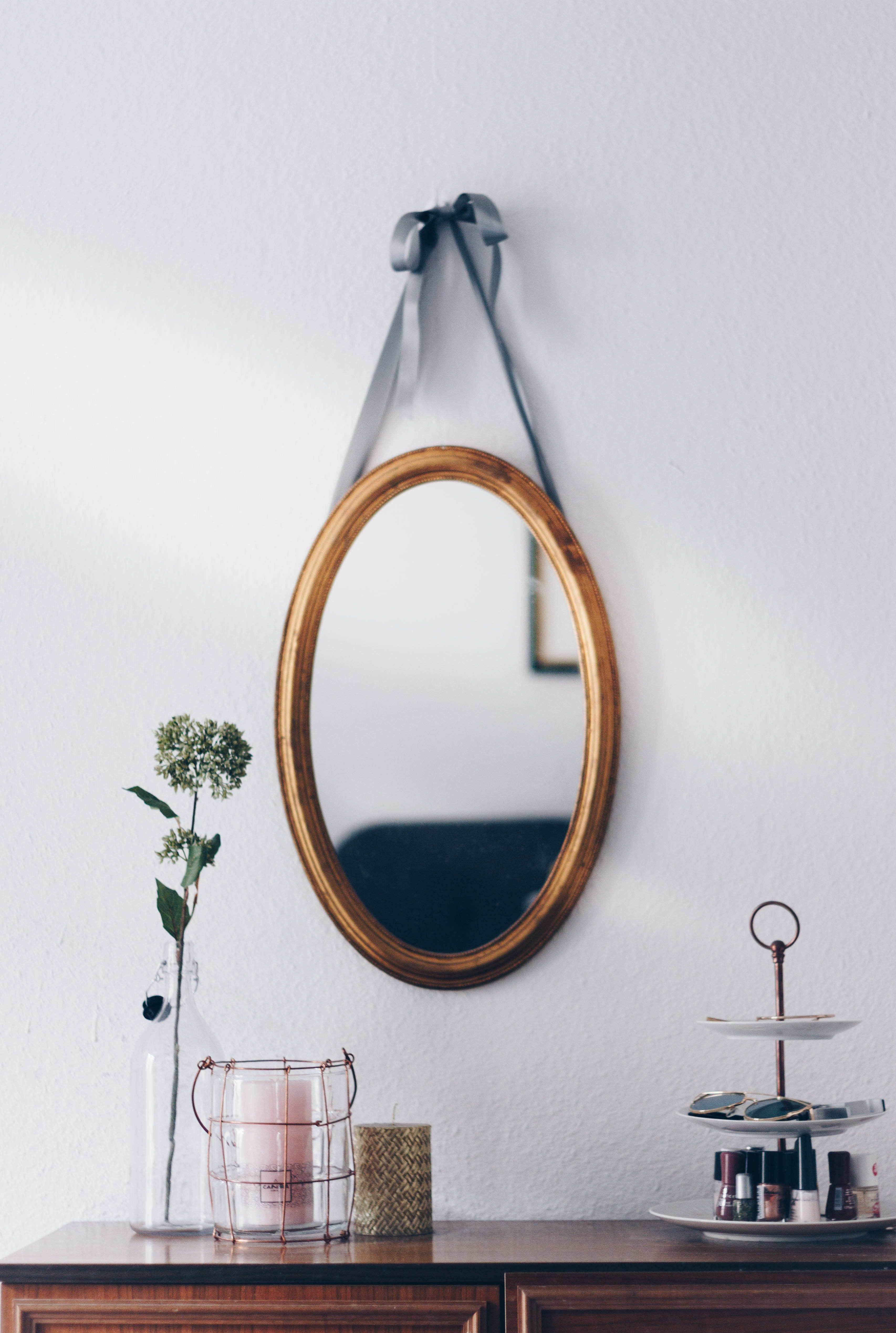 oval brown wooden framed hanging mirror, gray ribbon, wooden dresser, 4K Phone Wallpaper