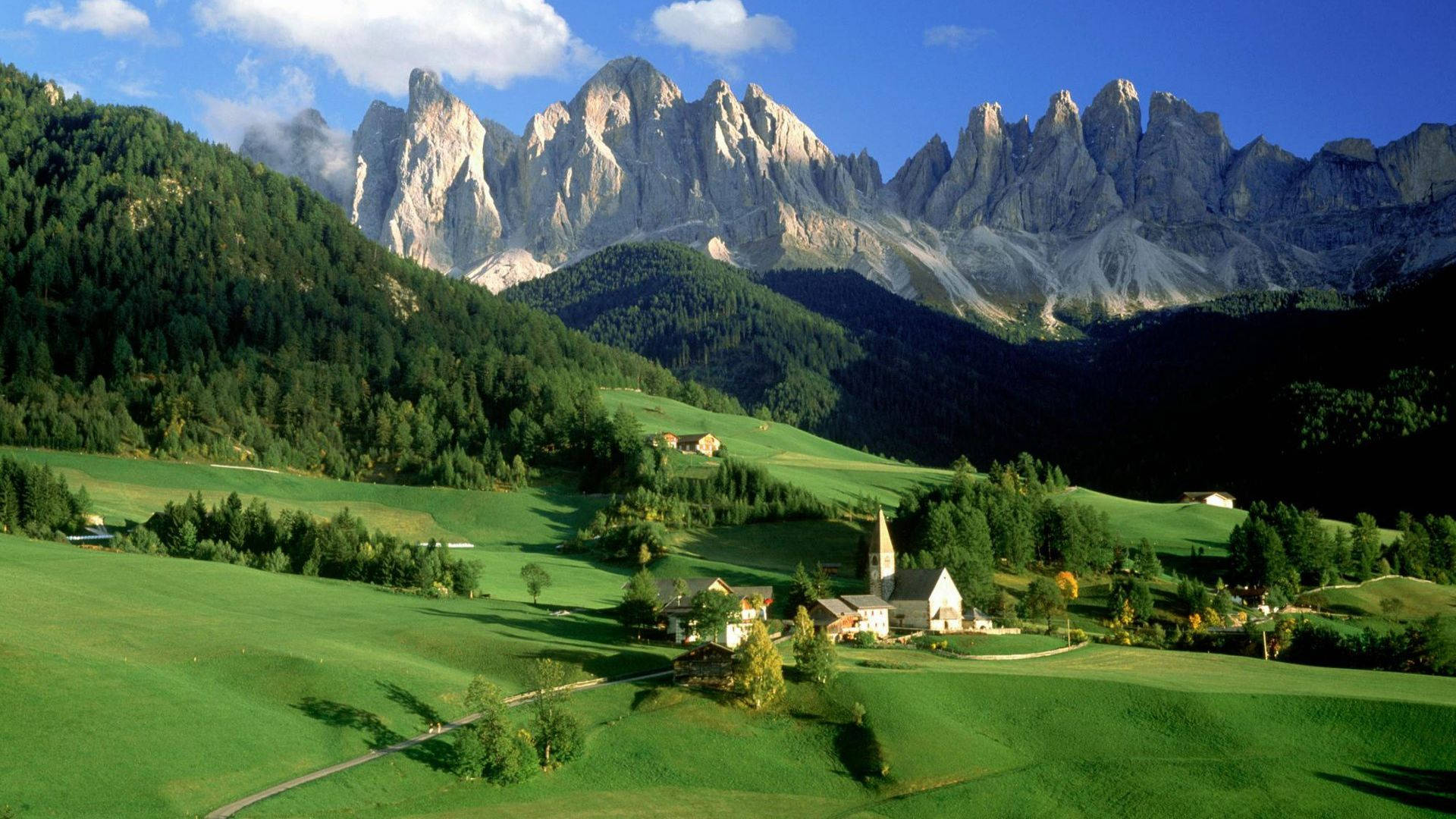 alpine village, lush green valleys, towering jagged mountain peaks, Full HD Desktop Wallpaper