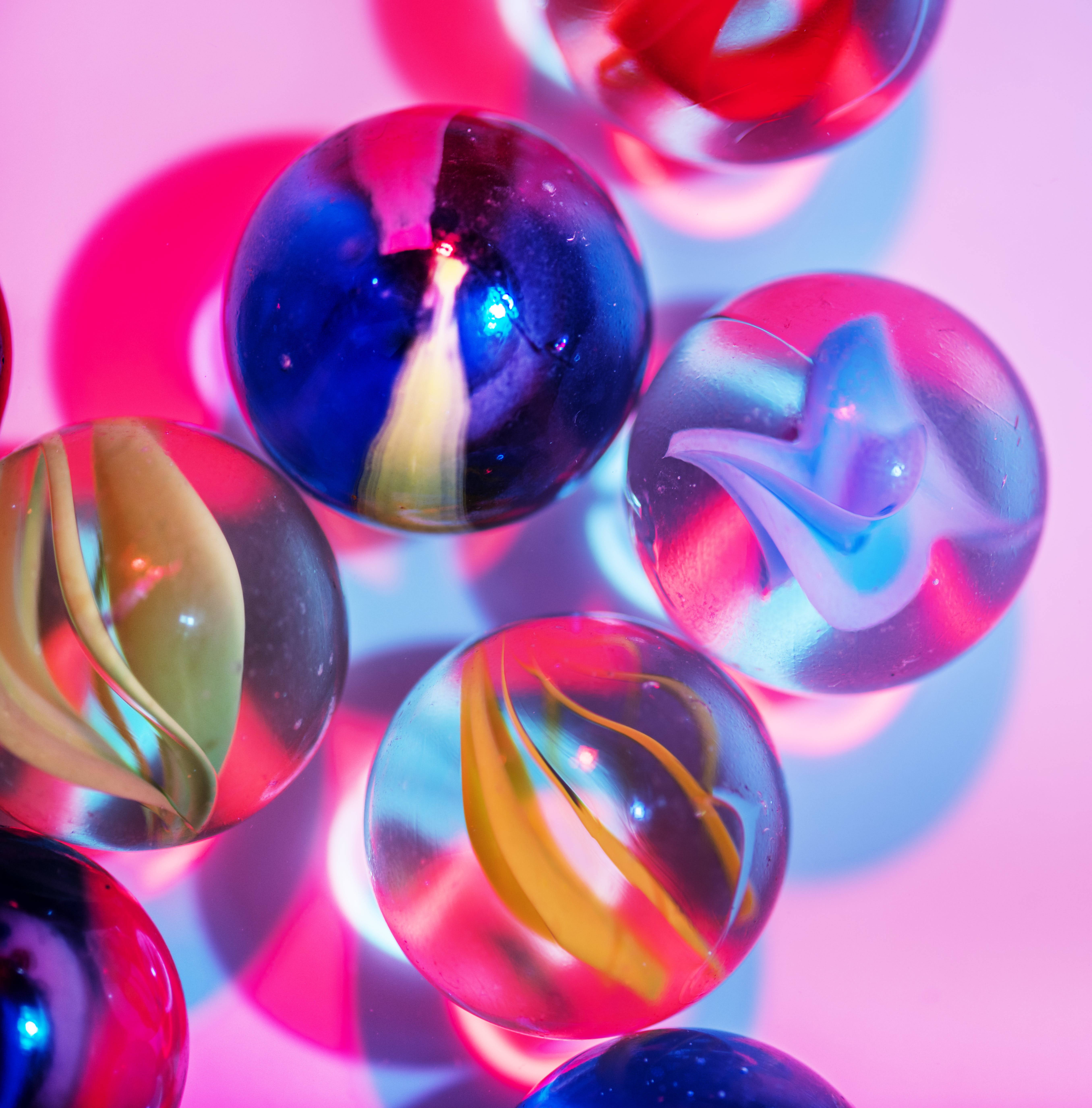 Elegant Aesthetic Marble Texture, neon pink and blue light, vibrant swirling marbles, 5K Phone Wallpaper