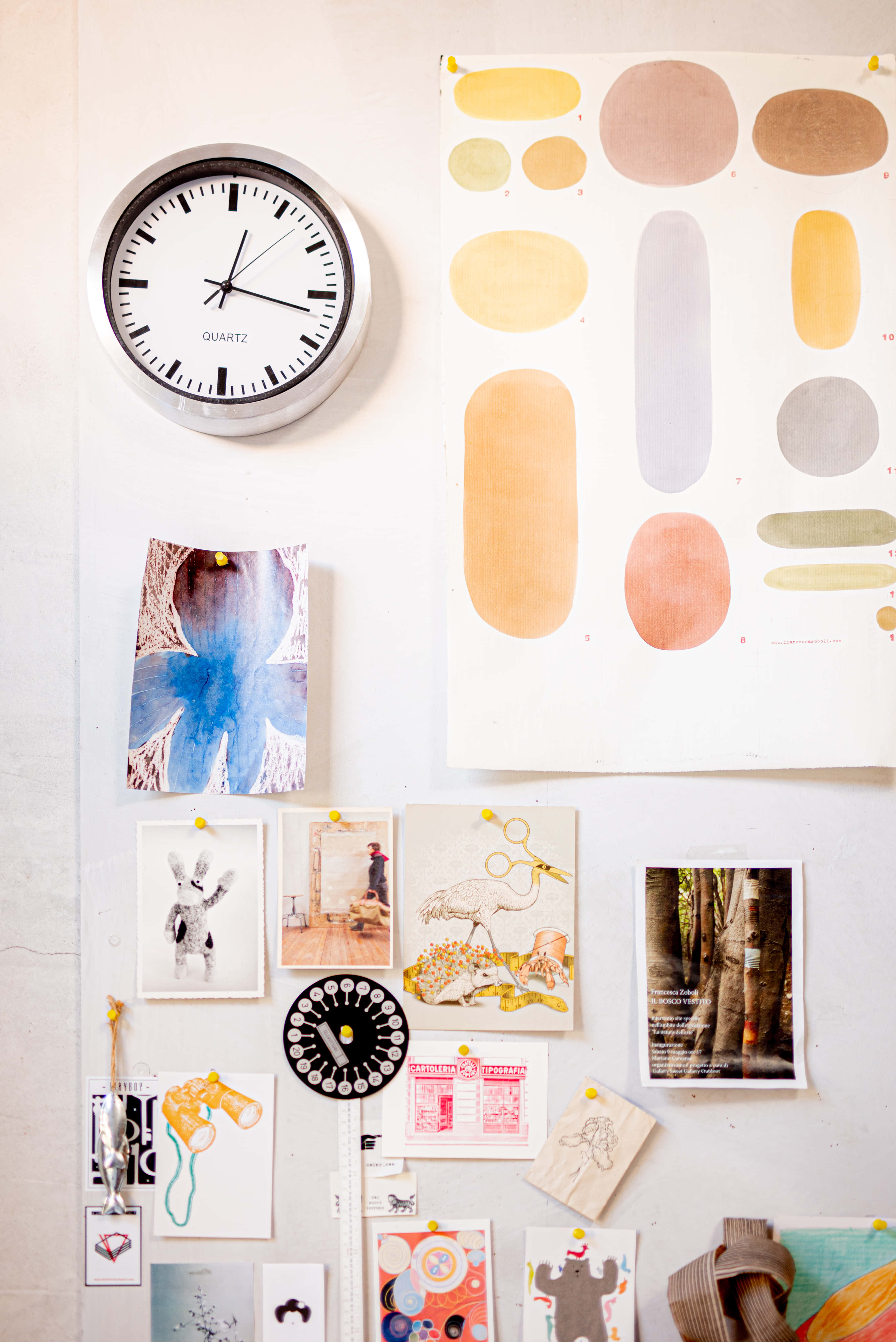 white wall, pinned artwork, clock, 5K Phone Wallpaper