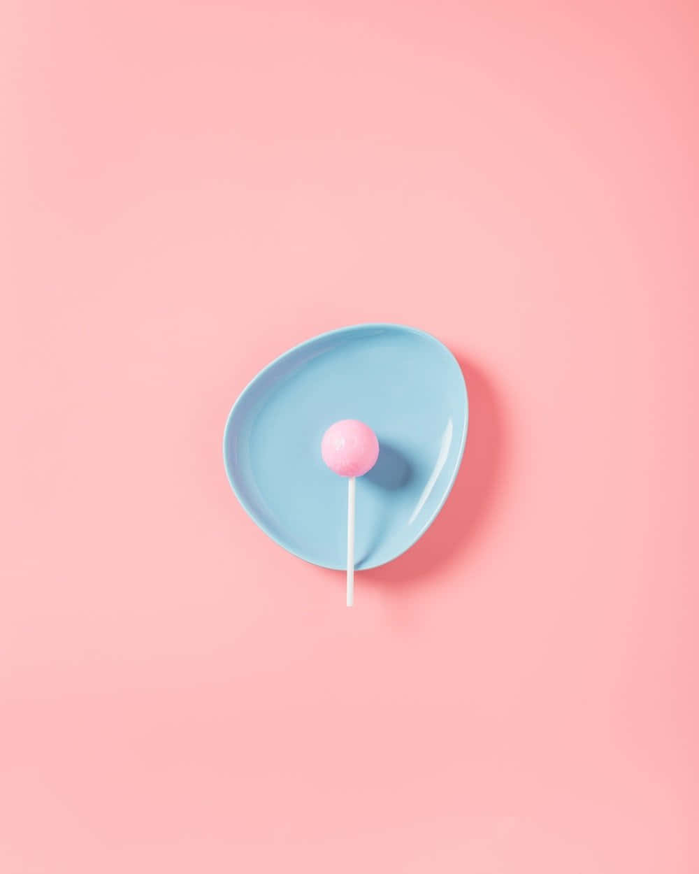 pink lollipop, light blue plate, soft pink background, SD Phone Wallpaper