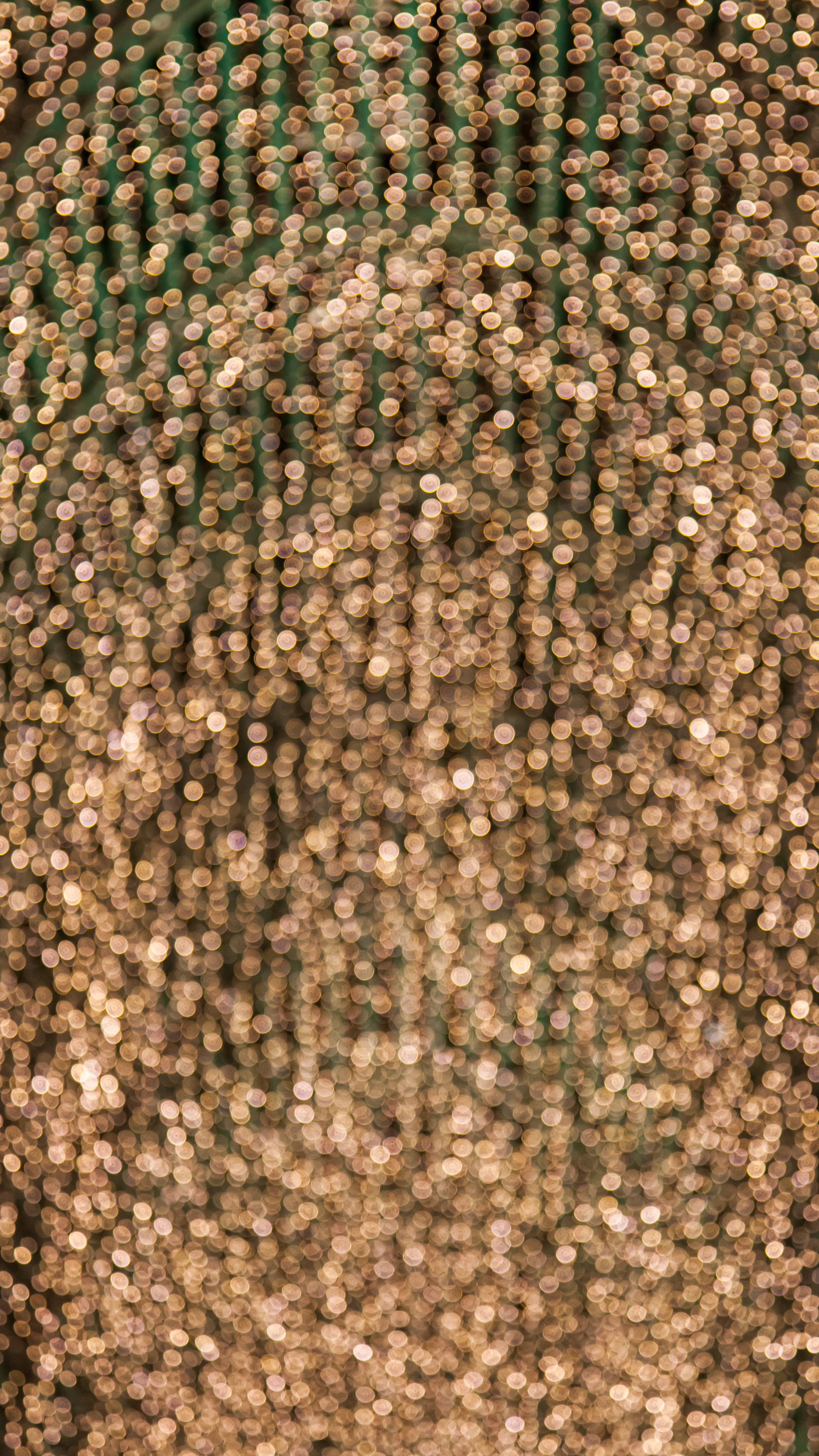 gold bokeh, shimmering gold sequins, vertical strands, 4K Phone Wallpaper